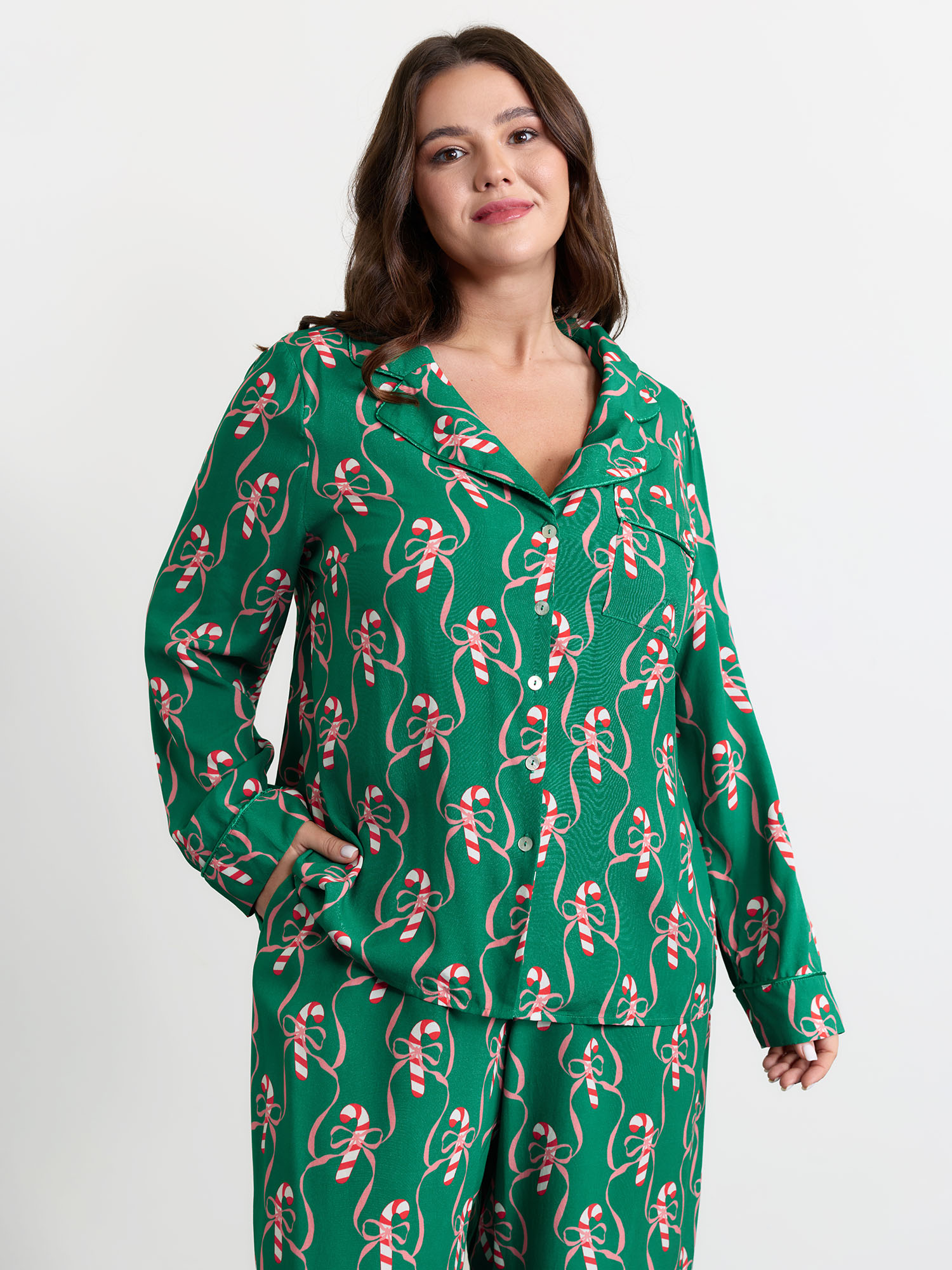 Side view of BloomChic Women's Plus Size Holiday Cheer Print Pockets Two-Piece Lounge Set Emerald Christmas Long Sleeve Non 18-20/2X