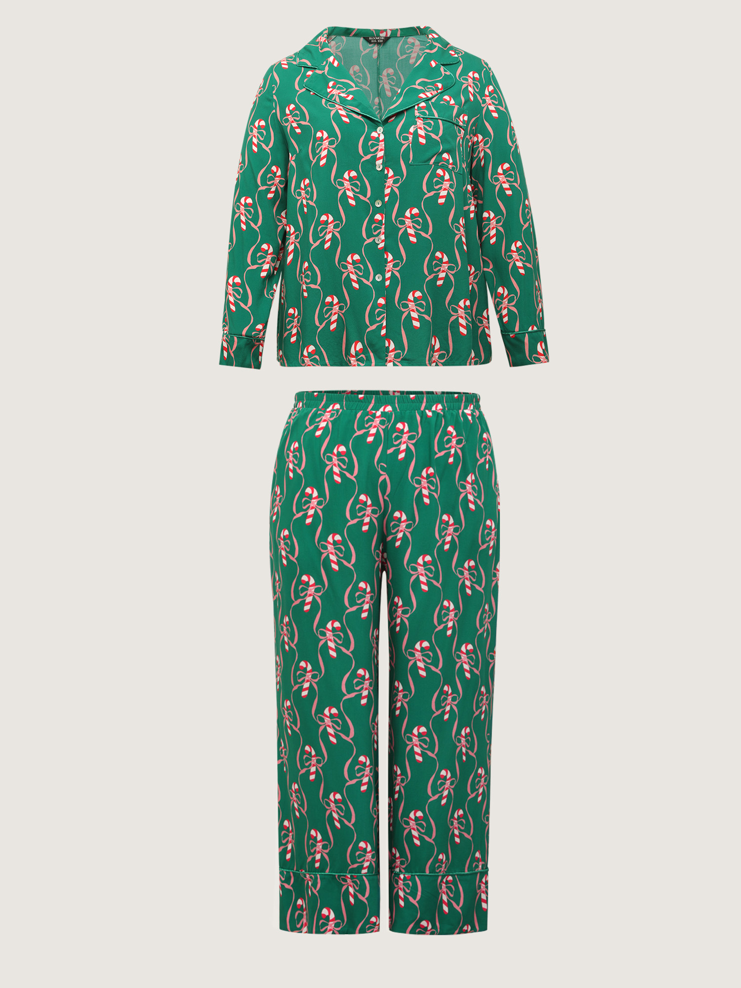 Side view of BloomChic Women's Plus Size Holiday Cheer Print Pockets Two-Piece Lounge Set Emerald Christmas Long Sleeve Non 18-20/2X