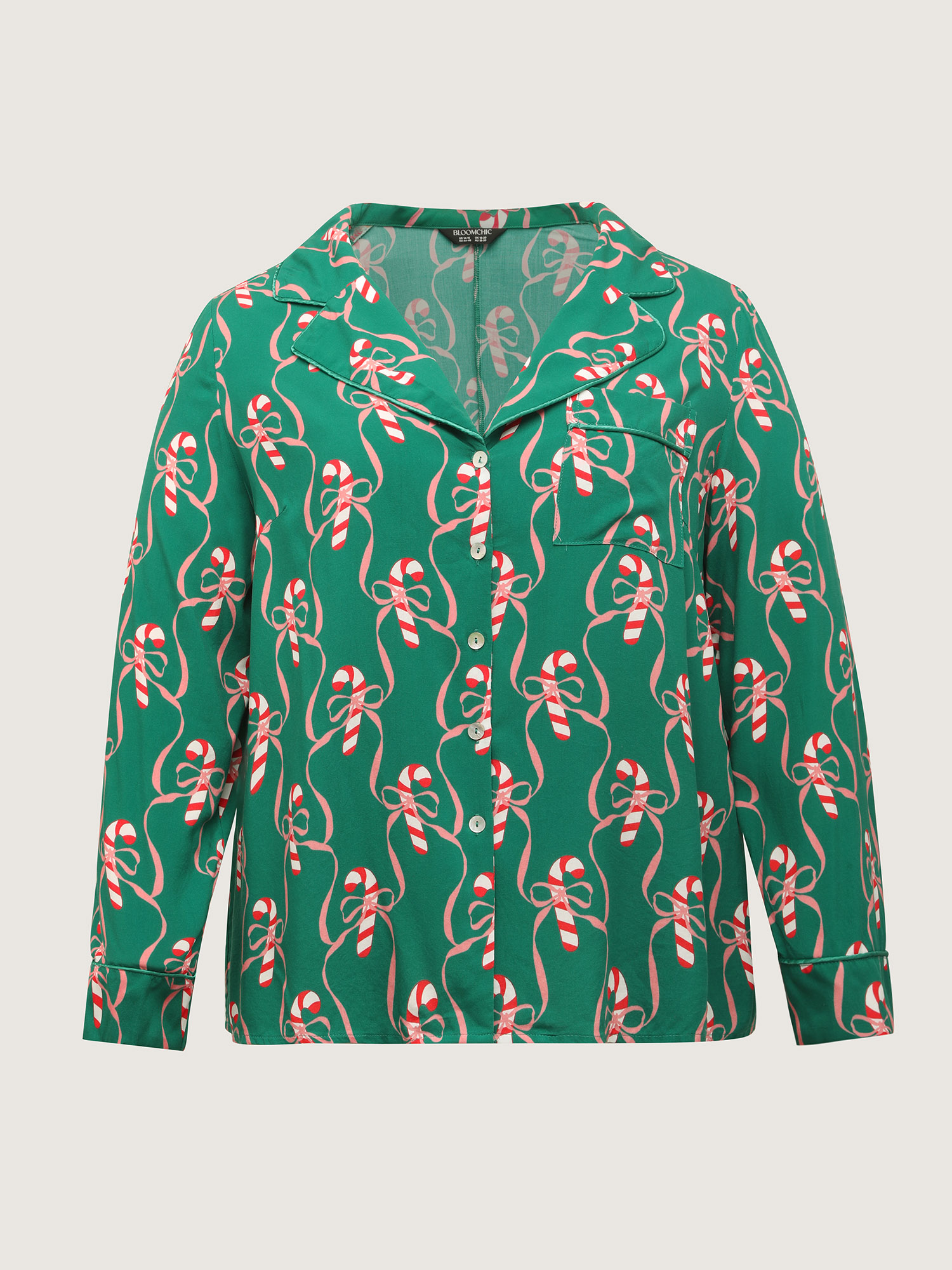 Side view of BloomChic Women's Plus Size Holiday Cheer Print Pockets Two-Piece Lounge Set Emerald Christmas Long Sleeve Non 18-20/2X
