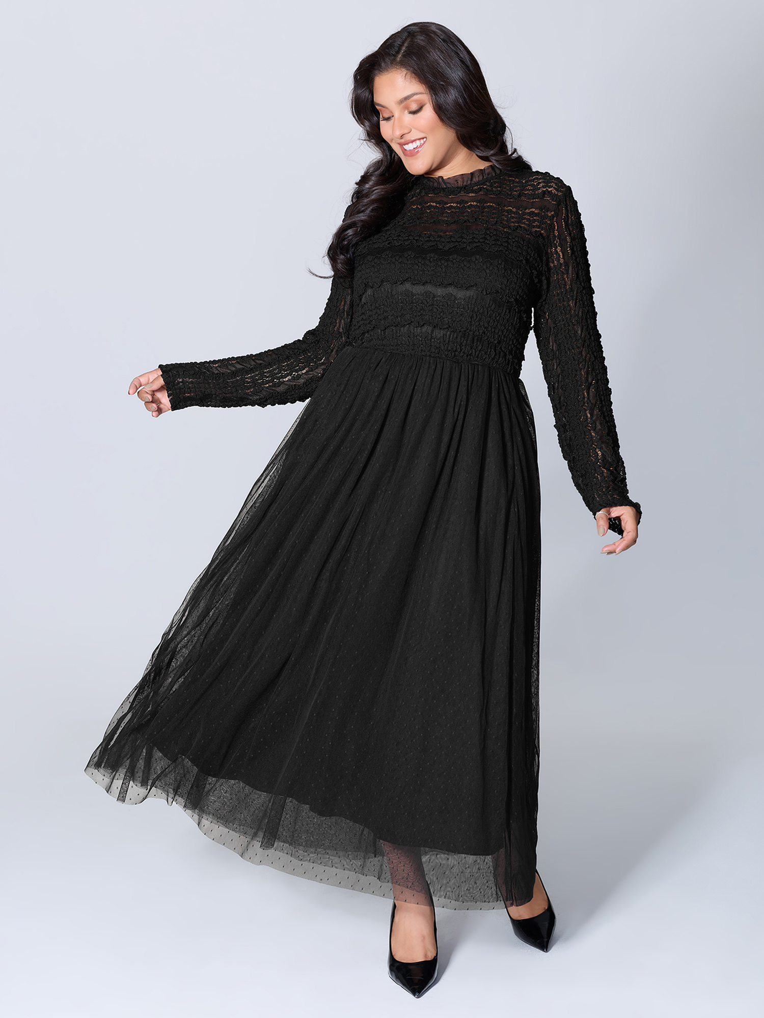 Side view of BloomChic Women's Plus Size Textured Lace Sheer Lined Maxi Dress Black Elegant Patchwork Mock Neck 12/L