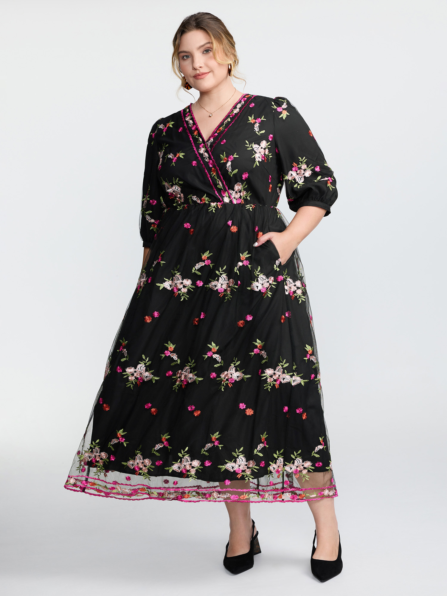 Side view of BloomChic Women's Plus Size Floral Embroidered Mesh Lined Party Dress Black Elegant Maxi 30/6X