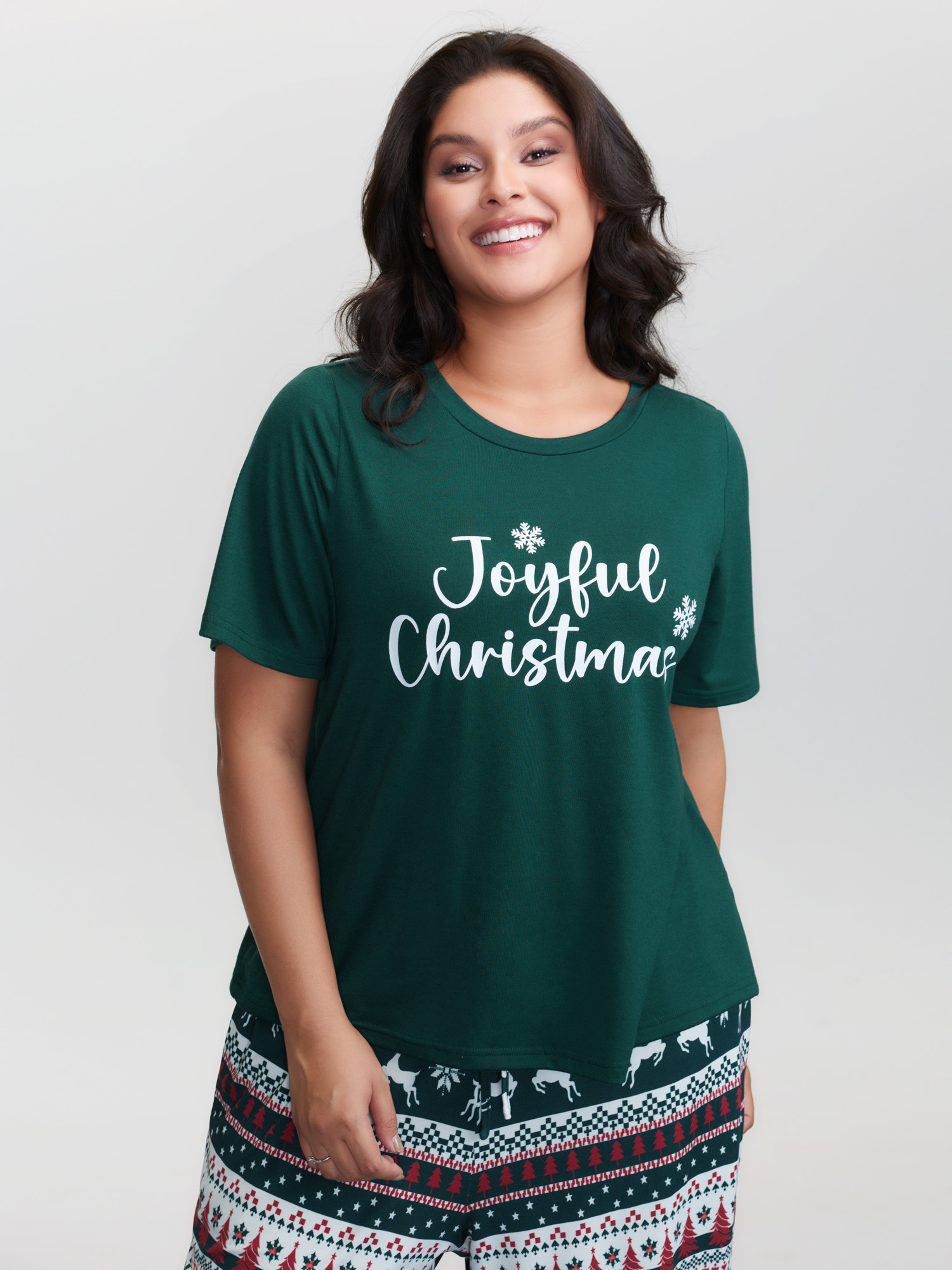 Side view of BloomChic Women's Plus Size Joyful Holidays Stretchy Loungewear Set DarkGreen Letter Short sleeve 26/4X