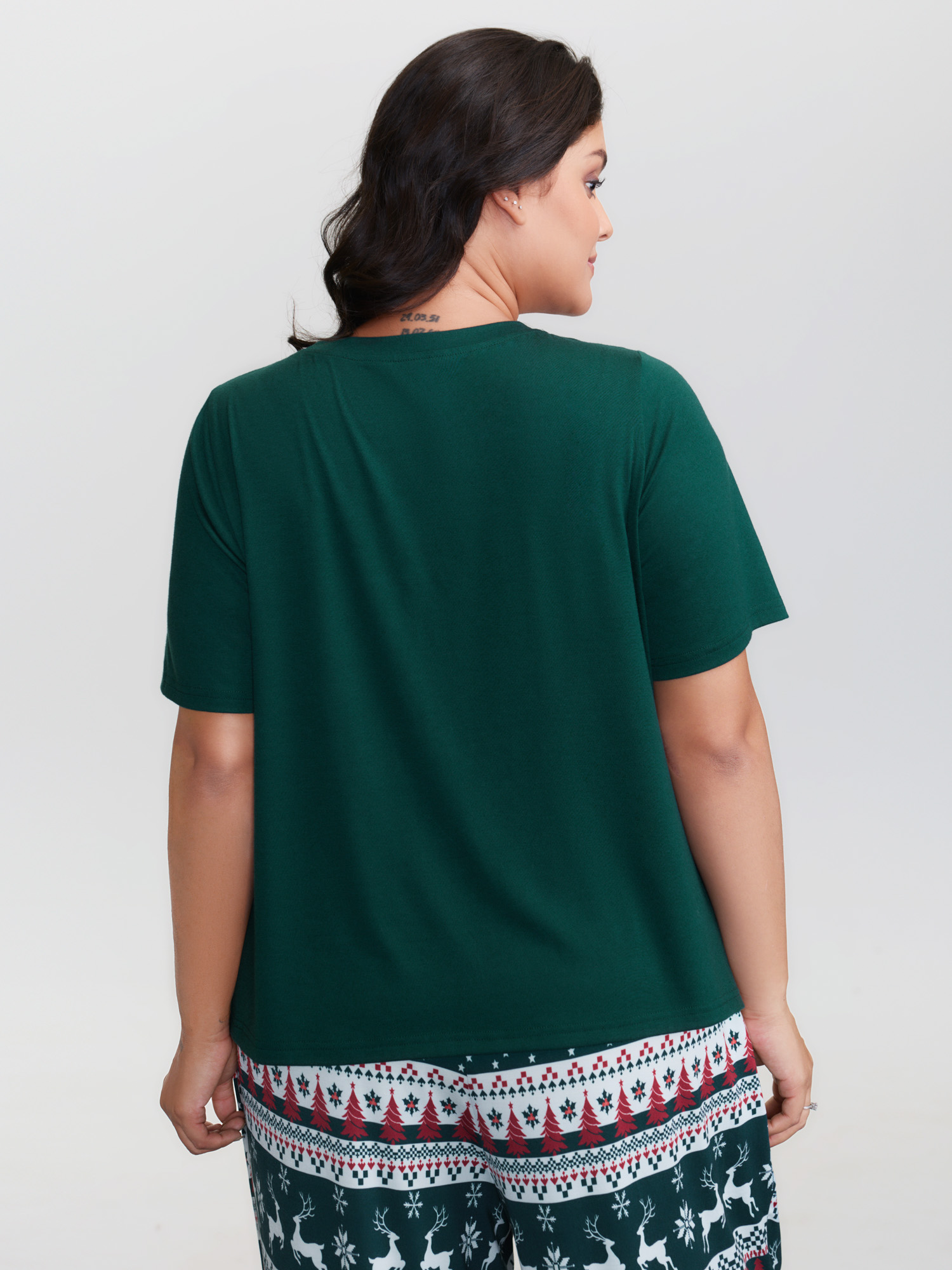 Side view of BloomChic Women's Plus Size Joyful Holidays Stretchy Loungewear Set DarkGreen Letter Short sleeve 26/4X