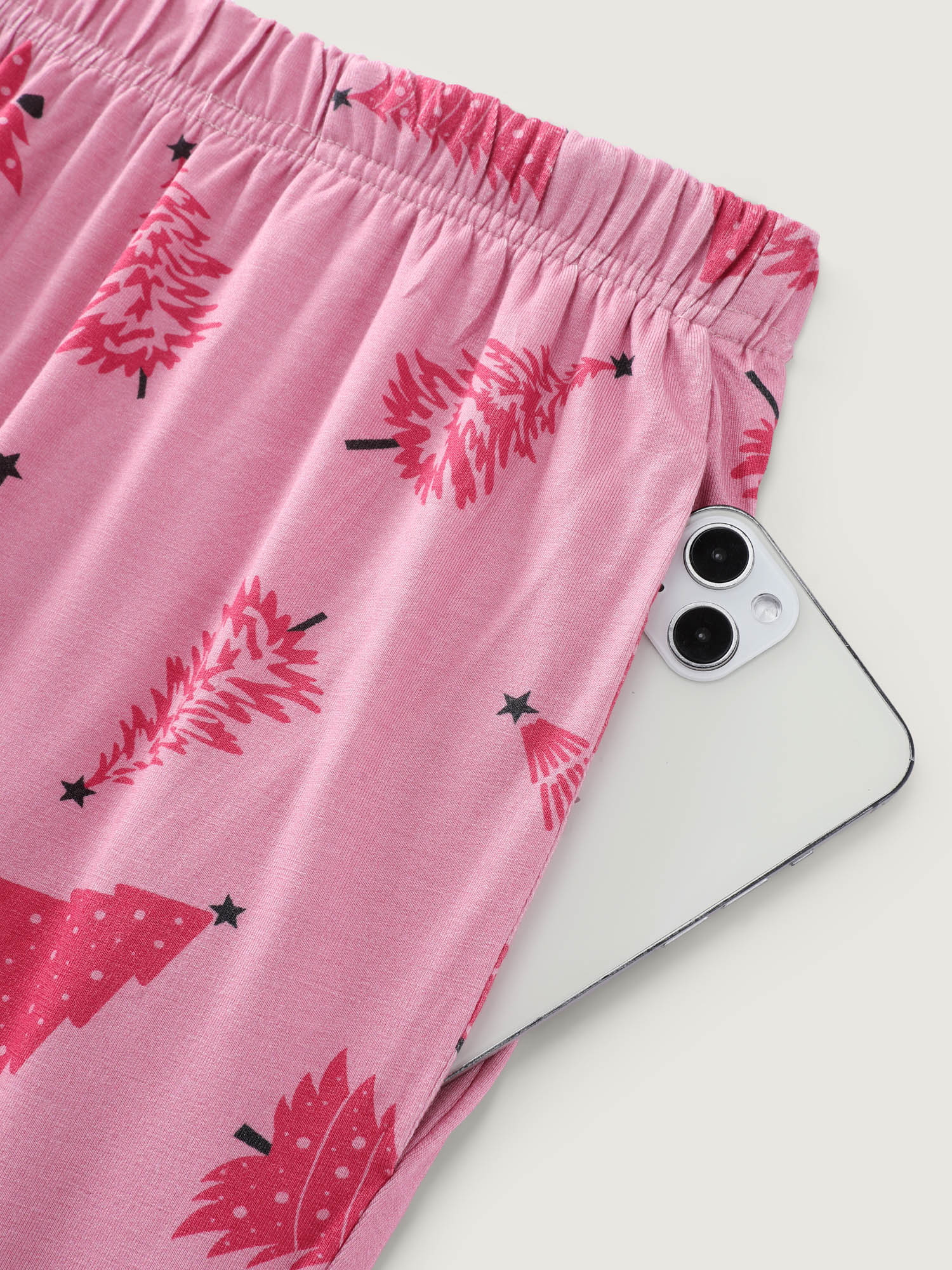 Side view of BloomChic Women's Plus Size Christmas Tree Print Buttons Co-Ord Pajama Set Blush Christmas 14-16/1X
