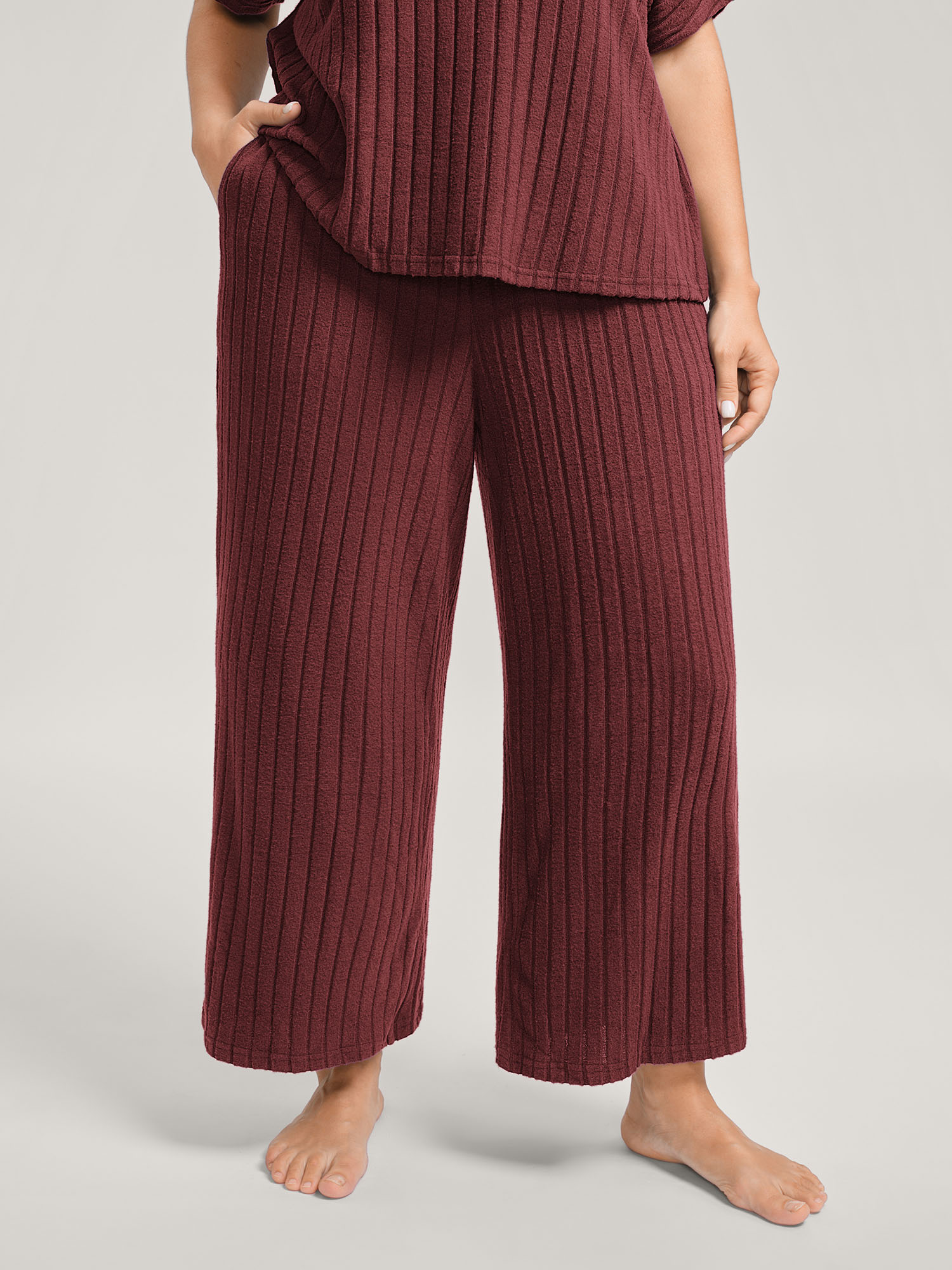 Side view of BloomChic Women's Plus Size Stretchy Pit Strip Solid Loungewear Set Burgundy Solid Short sleeve Non 14-16/1X
