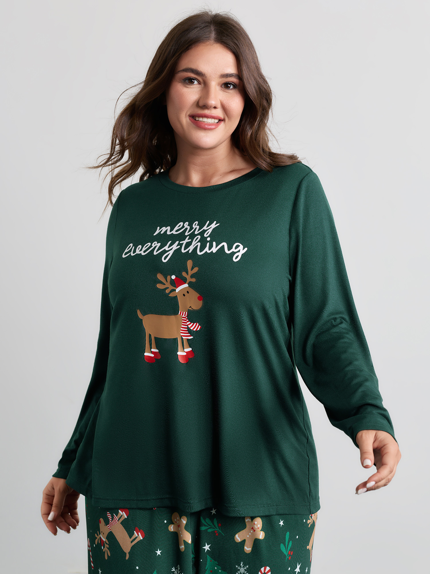 Side view of BloomChic Women's Plus Size Holiday Cozy Print Pockets Loungewear Set DarkGreen Christmas Long Sleeve Smocked 26/4X