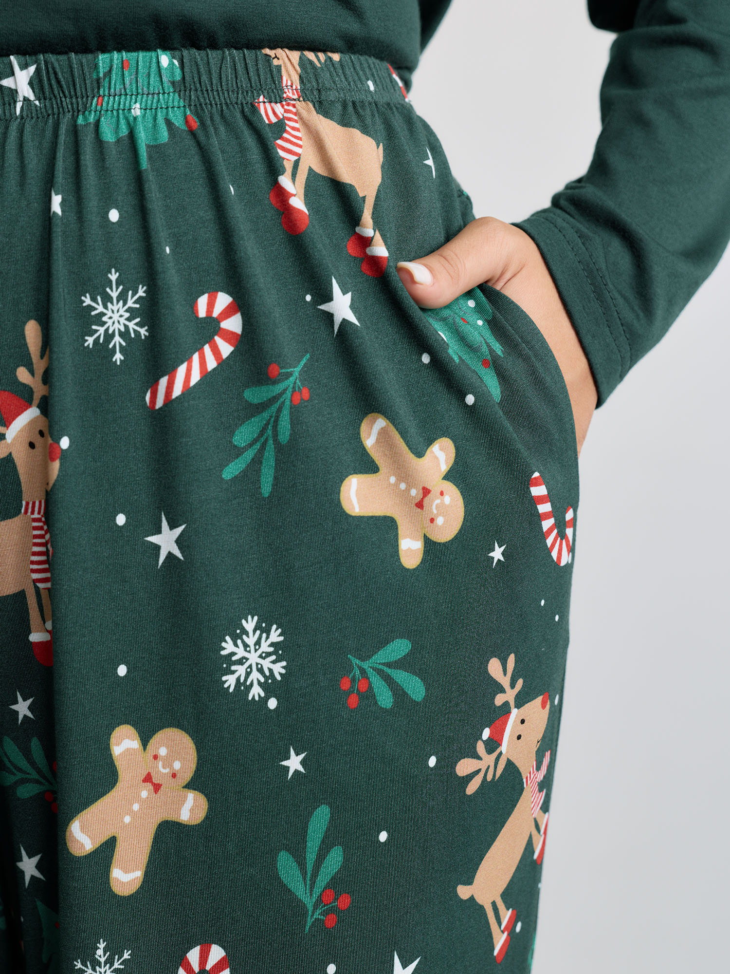 Side view of BloomChic Women's Plus Size Holiday Cozy Print Pockets Loungewear Set DarkGreen Christmas Long Sleeve Smocked 26/4X