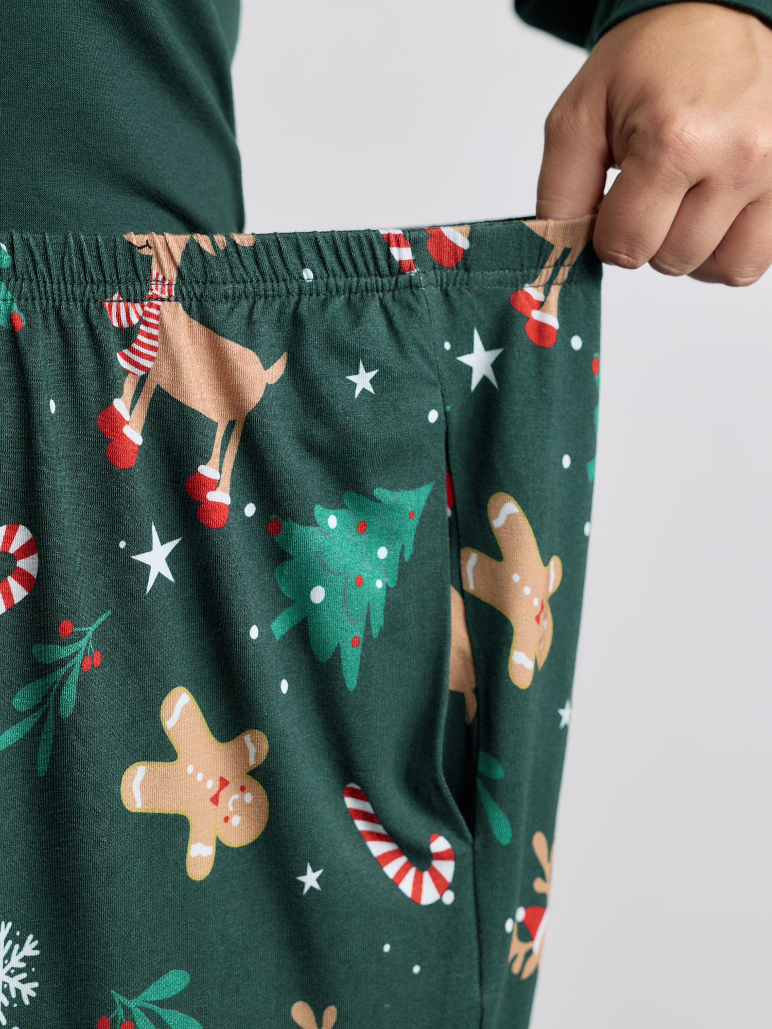 Side view of BloomChic Women's Plus Size Holiday Cozy Print Pockets Loungewear Set DarkGreen Christmas Long Sleeve Smocked 26/4X