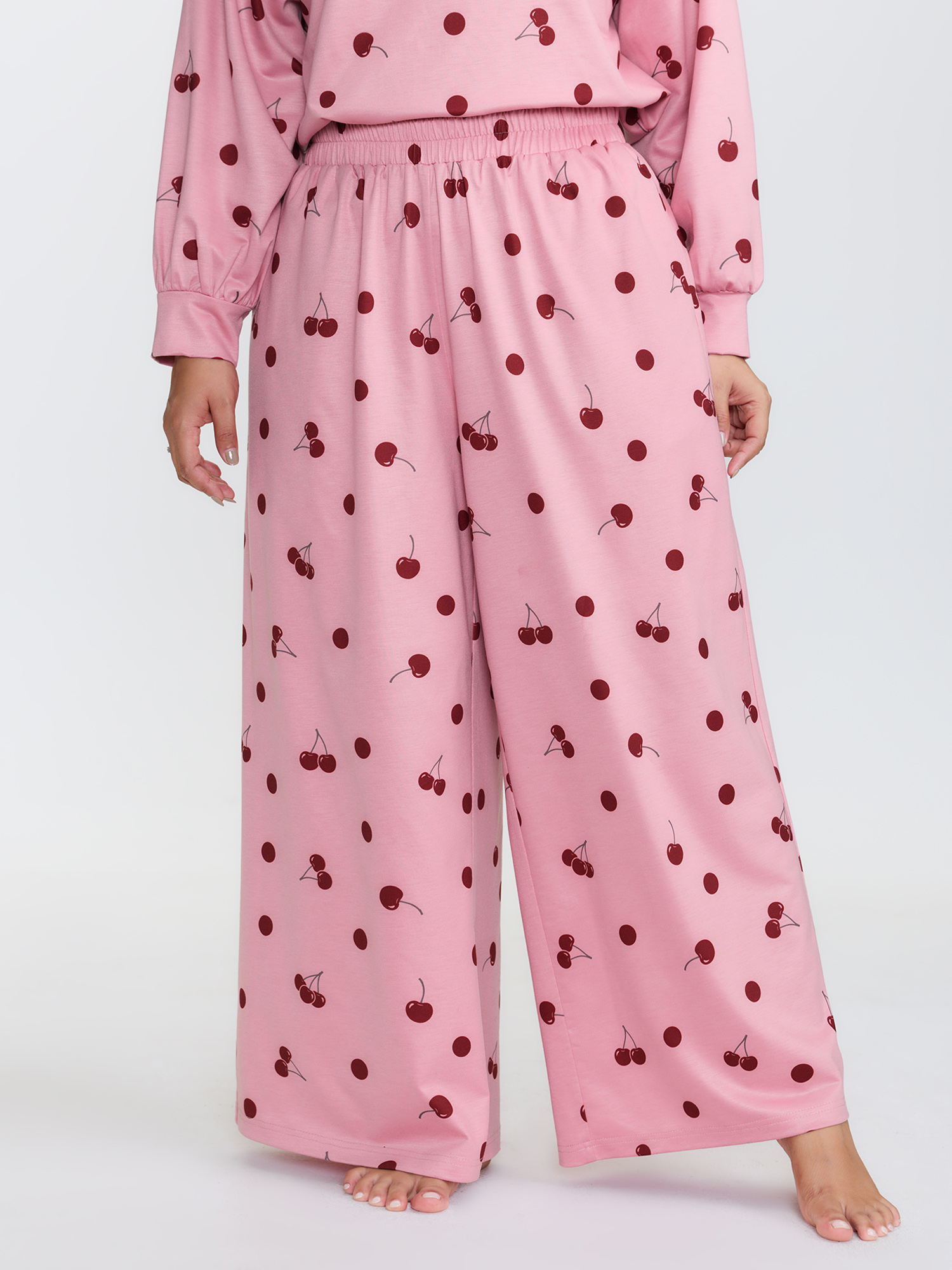 Side view of BloomChic Women's Plus Size Playful Cherry Print Loungewear Set Rouge Fruit and vegetable print Extra Long Sleeve 10/M