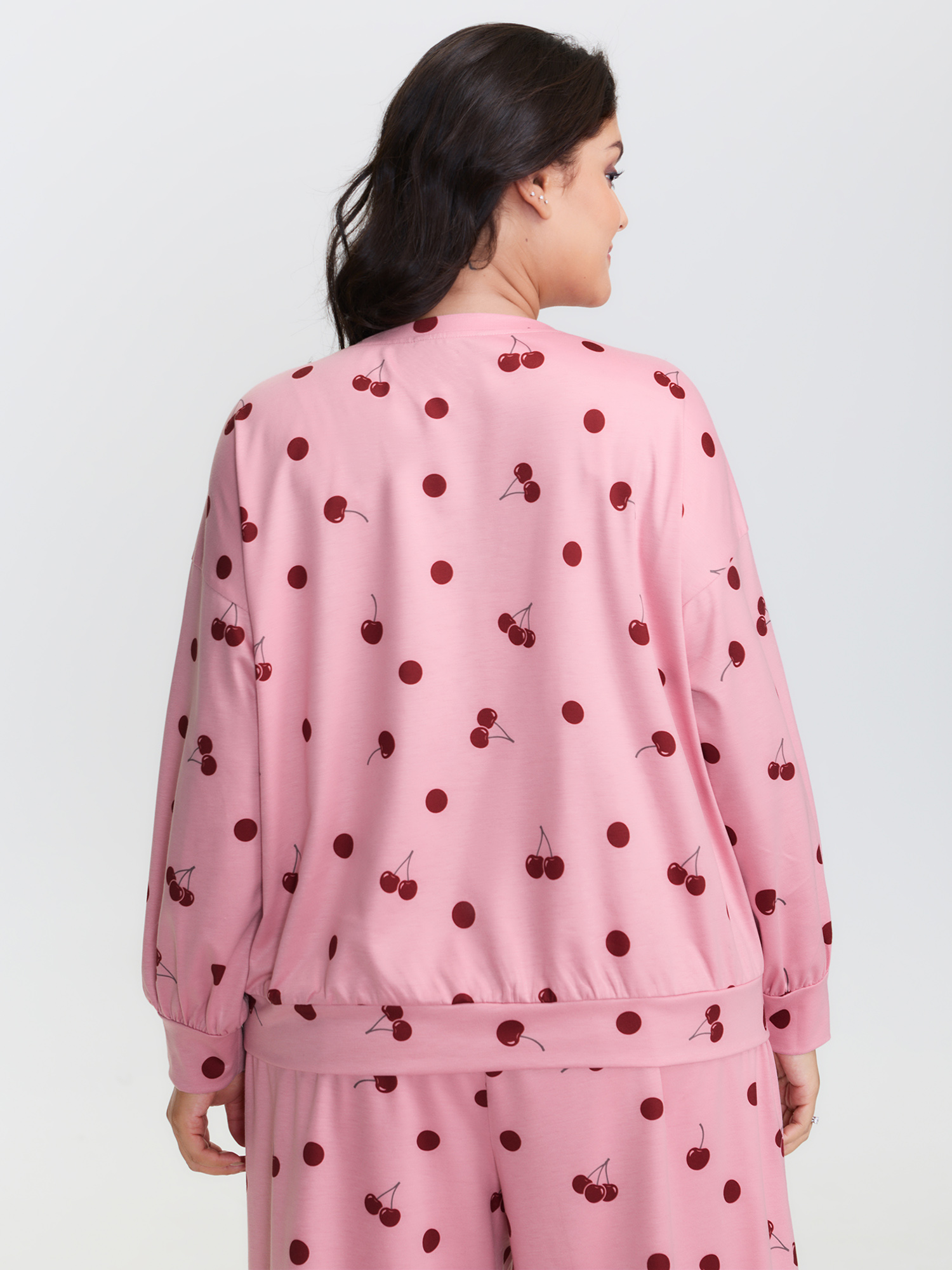 Side view of BloomChic Women's Plus Size Playful Cherry Print Loungewear Set Rouge Fruit and vegetable print Extra Long Sleeve 10/M