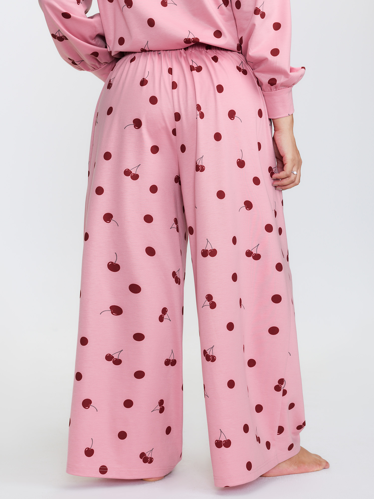 Side view of BloomChic Women's Plus Size Playful Cherry Print Loungewear Set Rouge Fruit and vegetable print Extra Long Sleeve 10/M