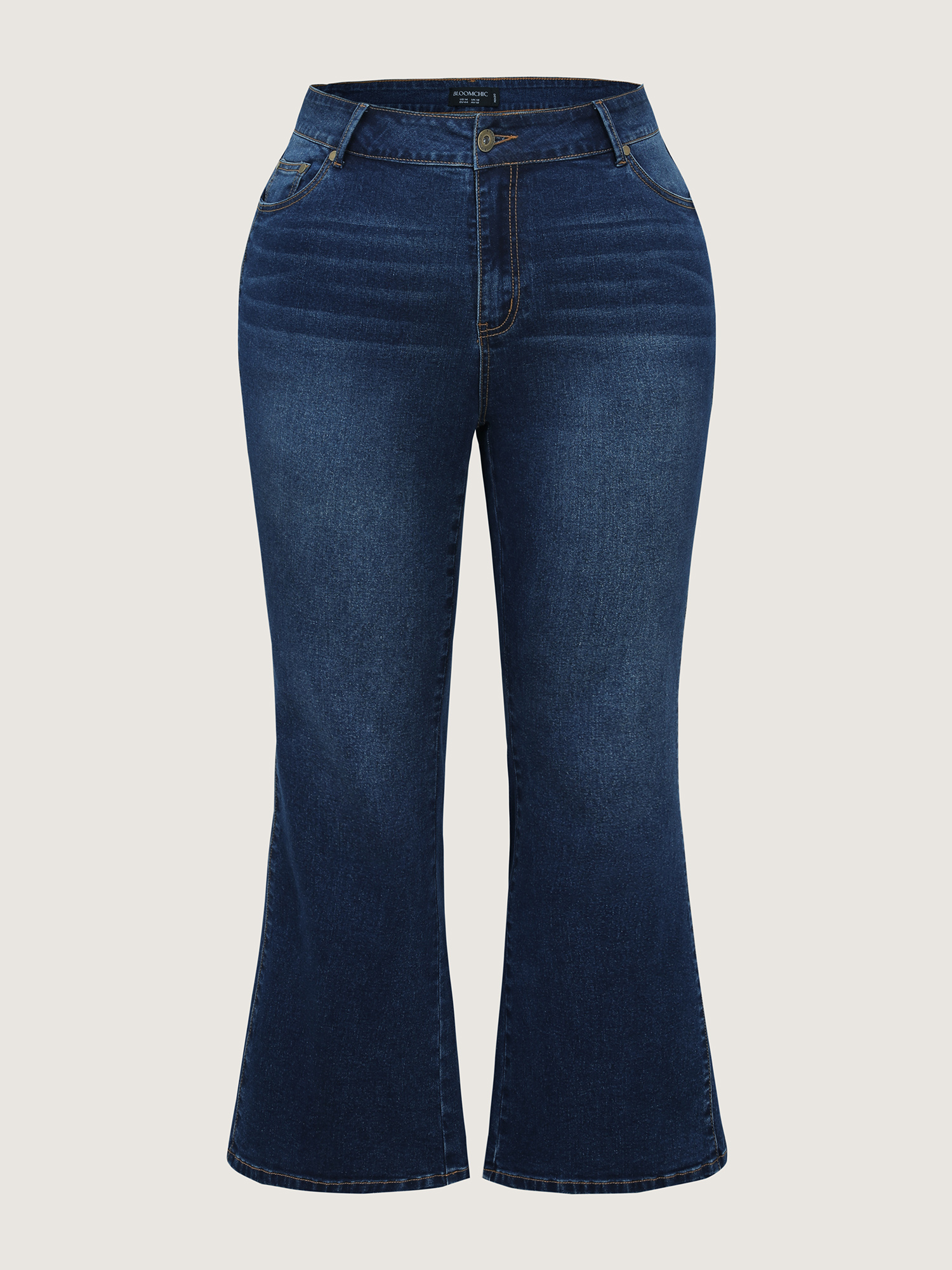 Side view of BloomChic Women's Plus Size Mid-Rise Flare Hem Jeans Denimindigo Flared High stretch 30/6X