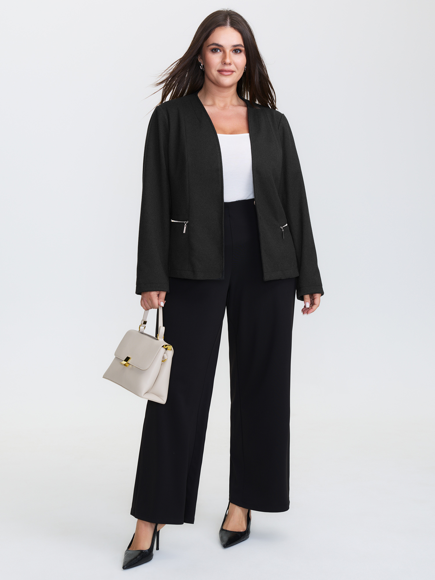 Side view of BloomChic Women's Plus Size Textured Lined Zipper Pocket Blazer Black Sleeve Long Sleeve 10/M