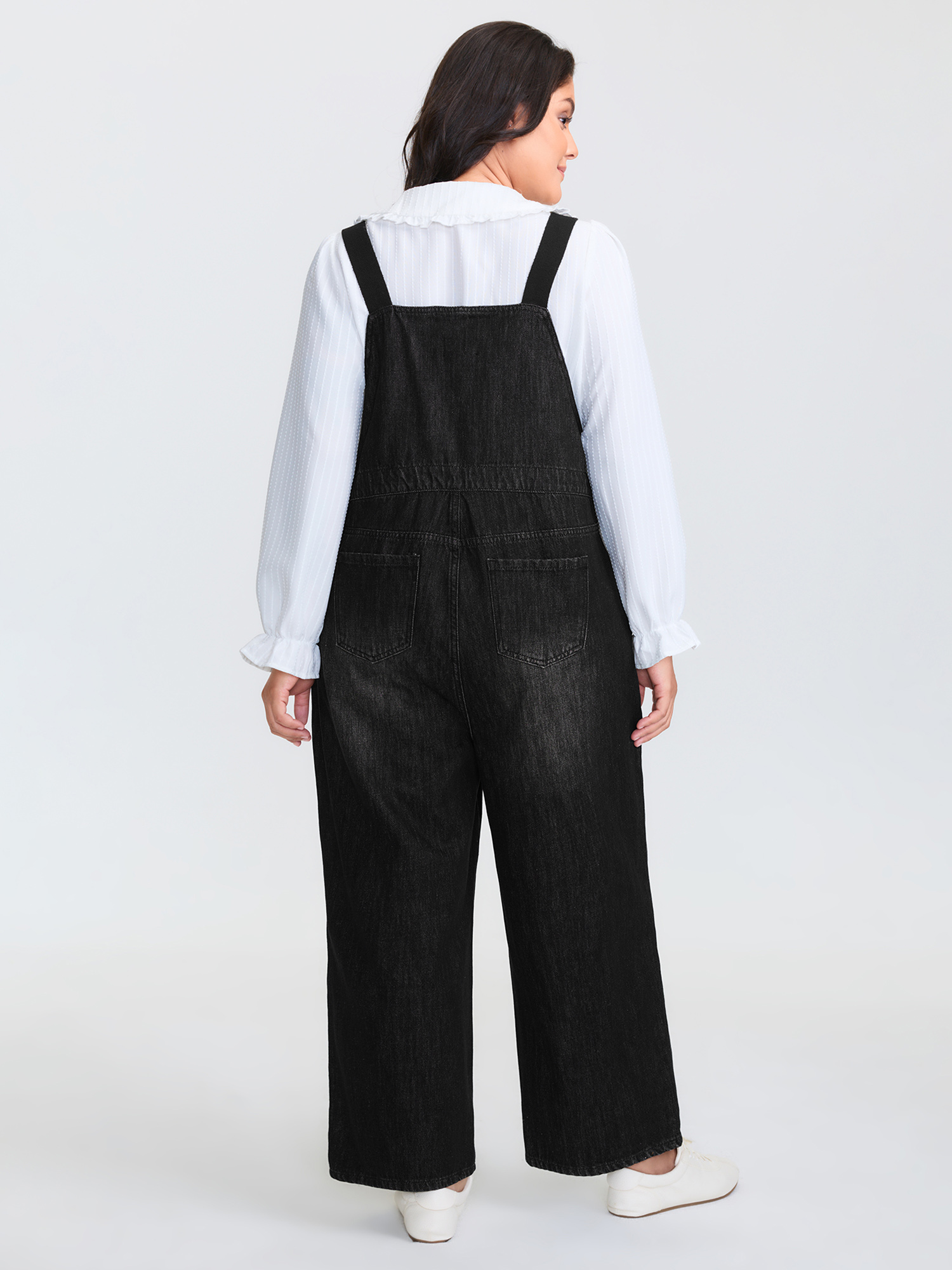 Side view of BloomChic Women's Plus Size Cotton Denim Adjustable Strap Pocketed Jumpsuit Acidwashblack not graphics Casual Button Front No stretch 28/5X