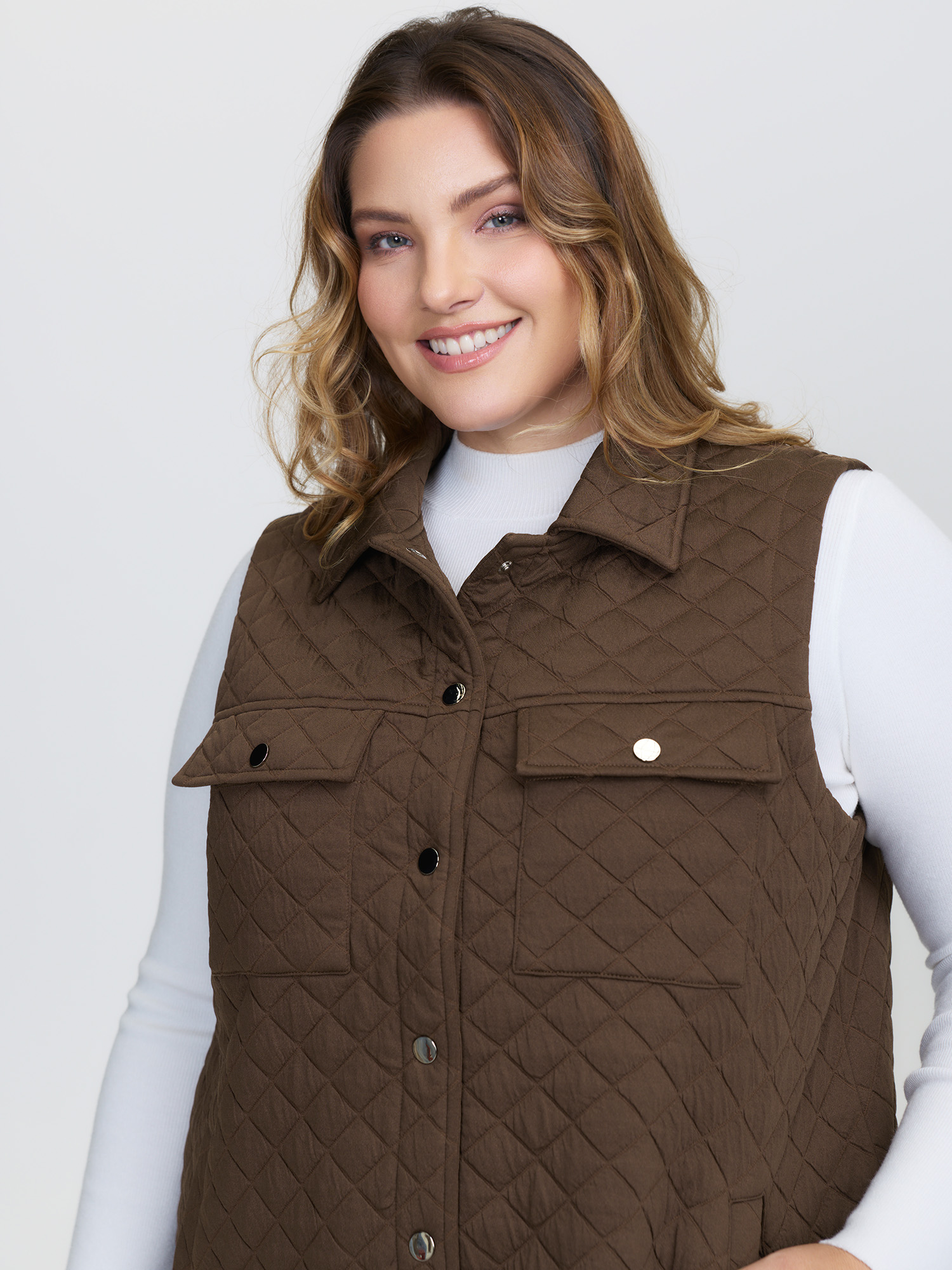 Side view of BloomChic Women's Plus Size Quilted Chest Pockets Button Vest Browncoffeecolor Topstitching 26/4X