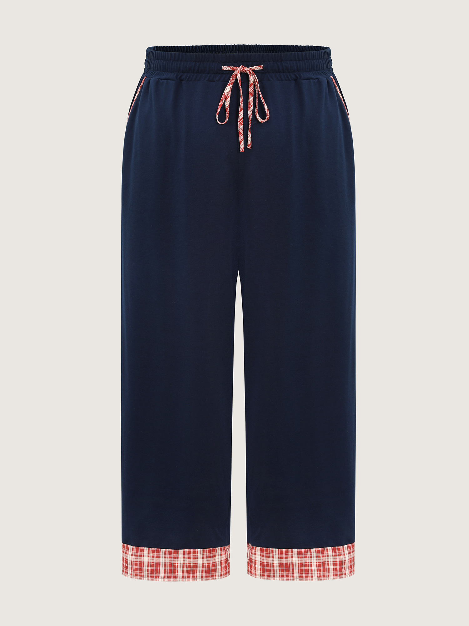 Side view of BloomChic Women's Plus Size Gingham Edges Stretchy Drawstring Lounge Bottoms Indigo Tall 30/6X