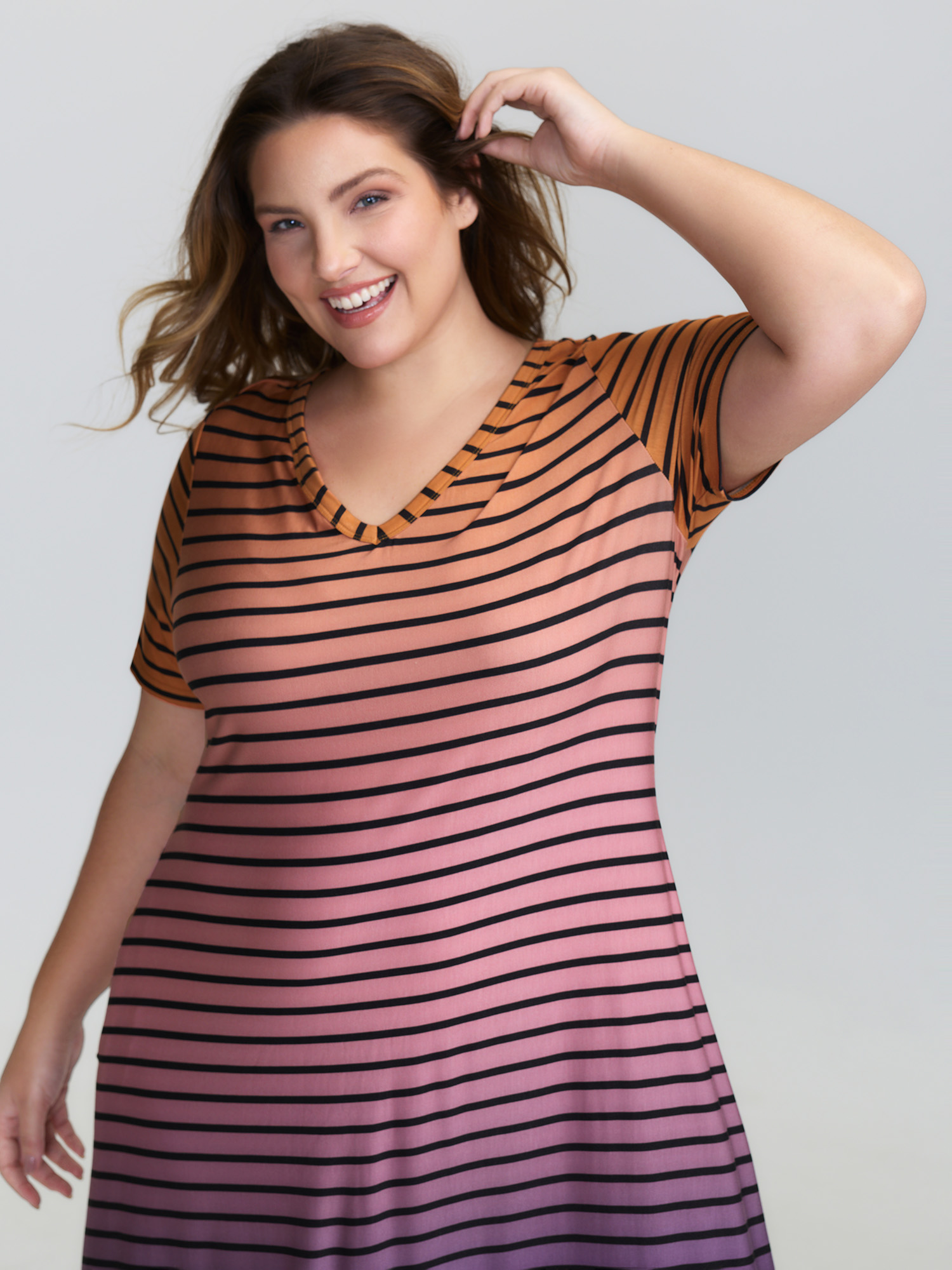 Side view of BloomChic Women's Plus Size Color Gradient Stripe Slit Lounge Dress Multicolor Midi 30/6X