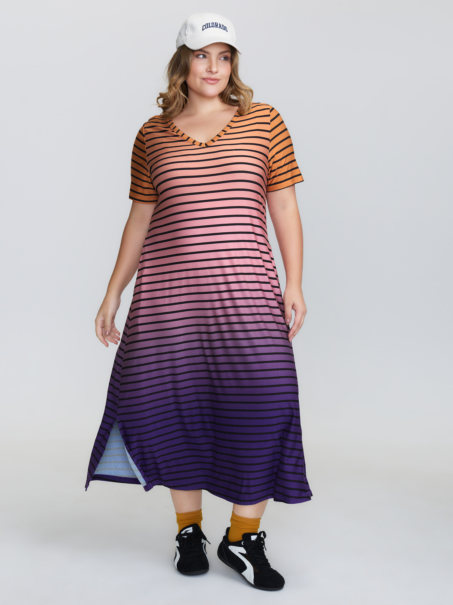 Side view of BloomChic Women's Plus Size Color Gradient Stripe Slit Lounge Dress Multicolor Midi 30/6X