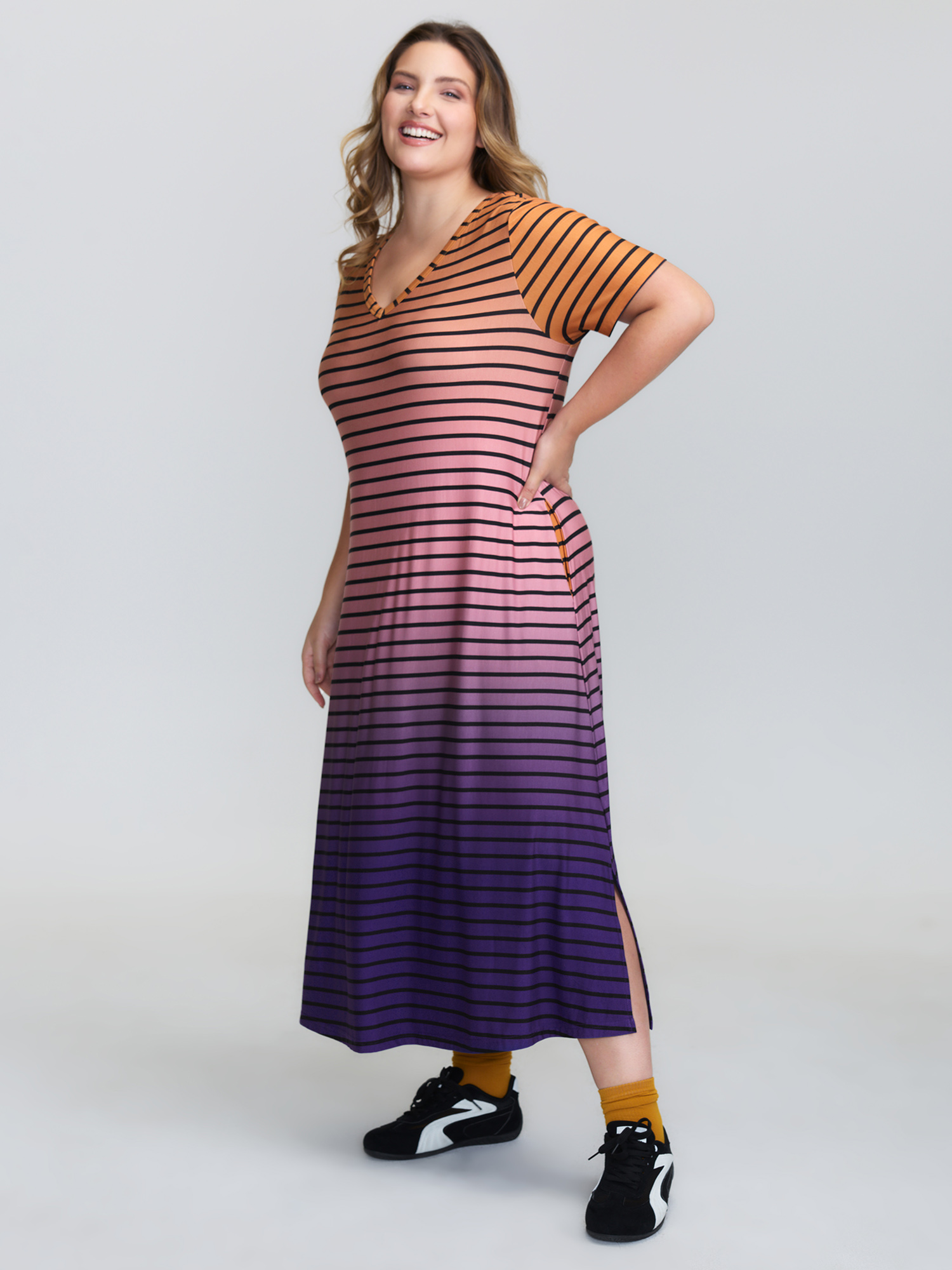 Side view of BloomChic Women's Plus Size Color Gradient Stripe Slit Lounge Dress Multicolor Midi 30/6X
