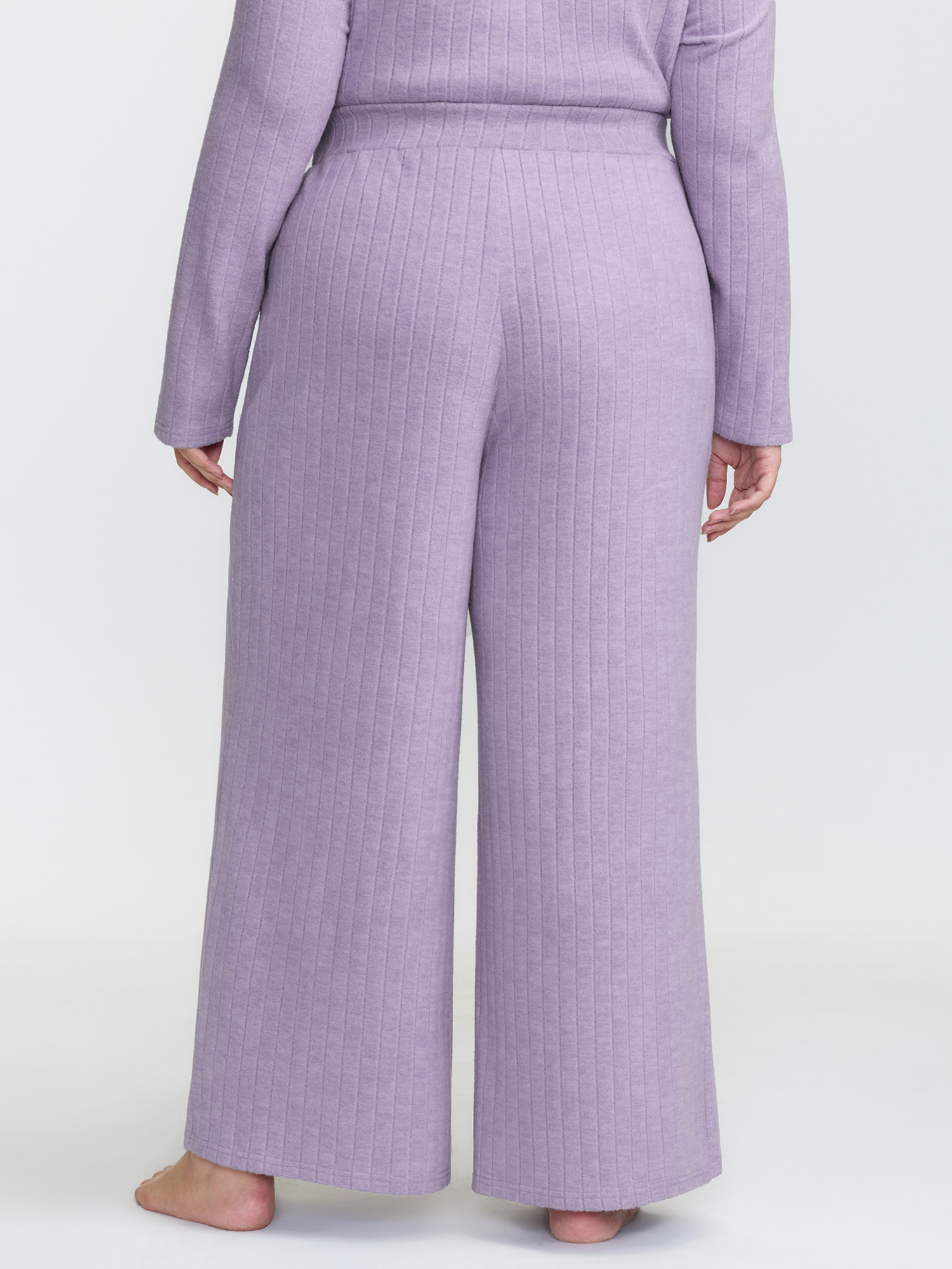 Side view of BloomChic Women's Plus Size Brushed Ribbed Wide-Leg Lounge Bottoms Lilac Short 26/4X