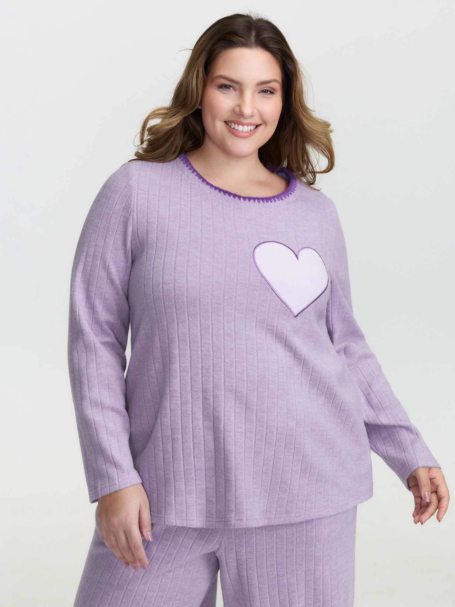 Side view of BloomChic Women's Plus Size Pastel Hearts Brushed Ribbed Embroidered Lounge Top Lilac Extra Long Sleeve 10/M
