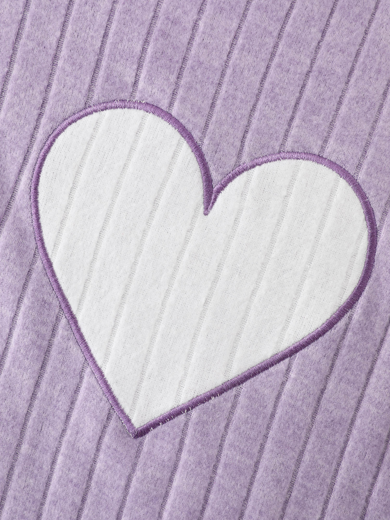 Side view of BloomChic Women's Plus Size Pastel Hearts Brushed Ribbed Embroidered Lounge Top Lilac Extra Long Sleeve 10/M