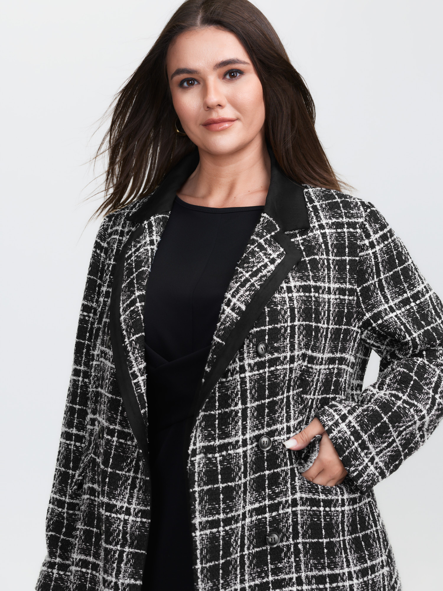 Side view of BloomChic Women's Plus Size Tweed Print Lined Double Breasted Blazer Black Sleeve Extra Long Sleeve 18-20/2X
