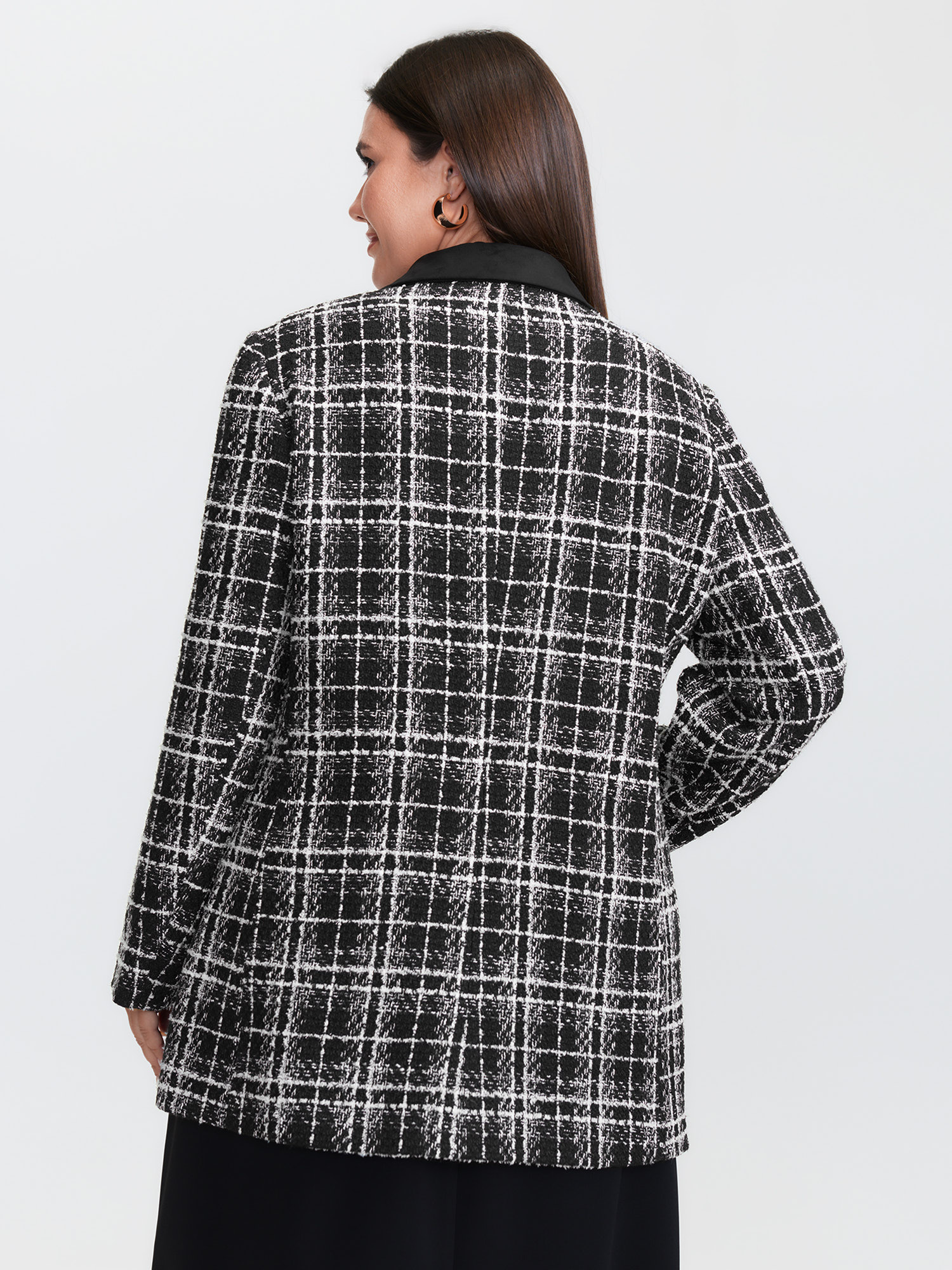 Side view of BloomChic Women's Plus Size Tweed Print Lined Double Breasted Blazer Black Sleeve Extra Long Sleeve 18-20/2X