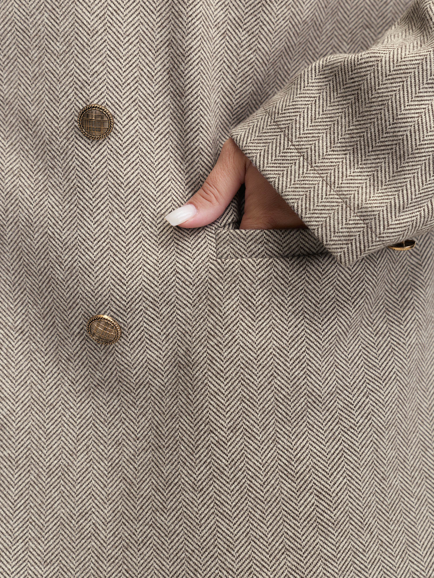 Side view of BloomChic Women's Plus Size Herringbone Pockets Double Button Blazer Tan Sleeve Long Sleeve 12/L