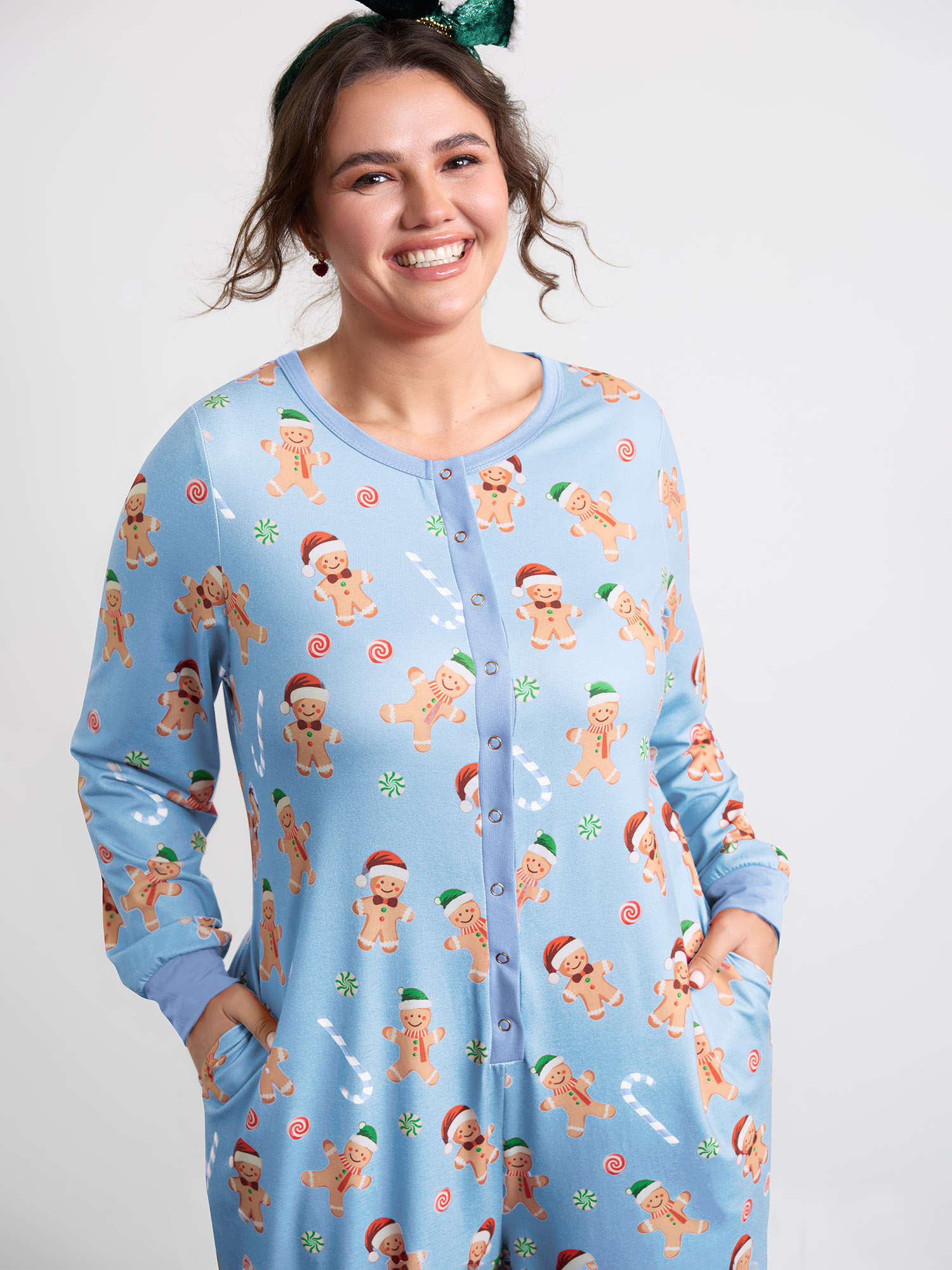 Side view of BloomChic Women's Plus Size Gingerbread Print Button Placket Jumpsuit LightBlue not graphics 30/6X