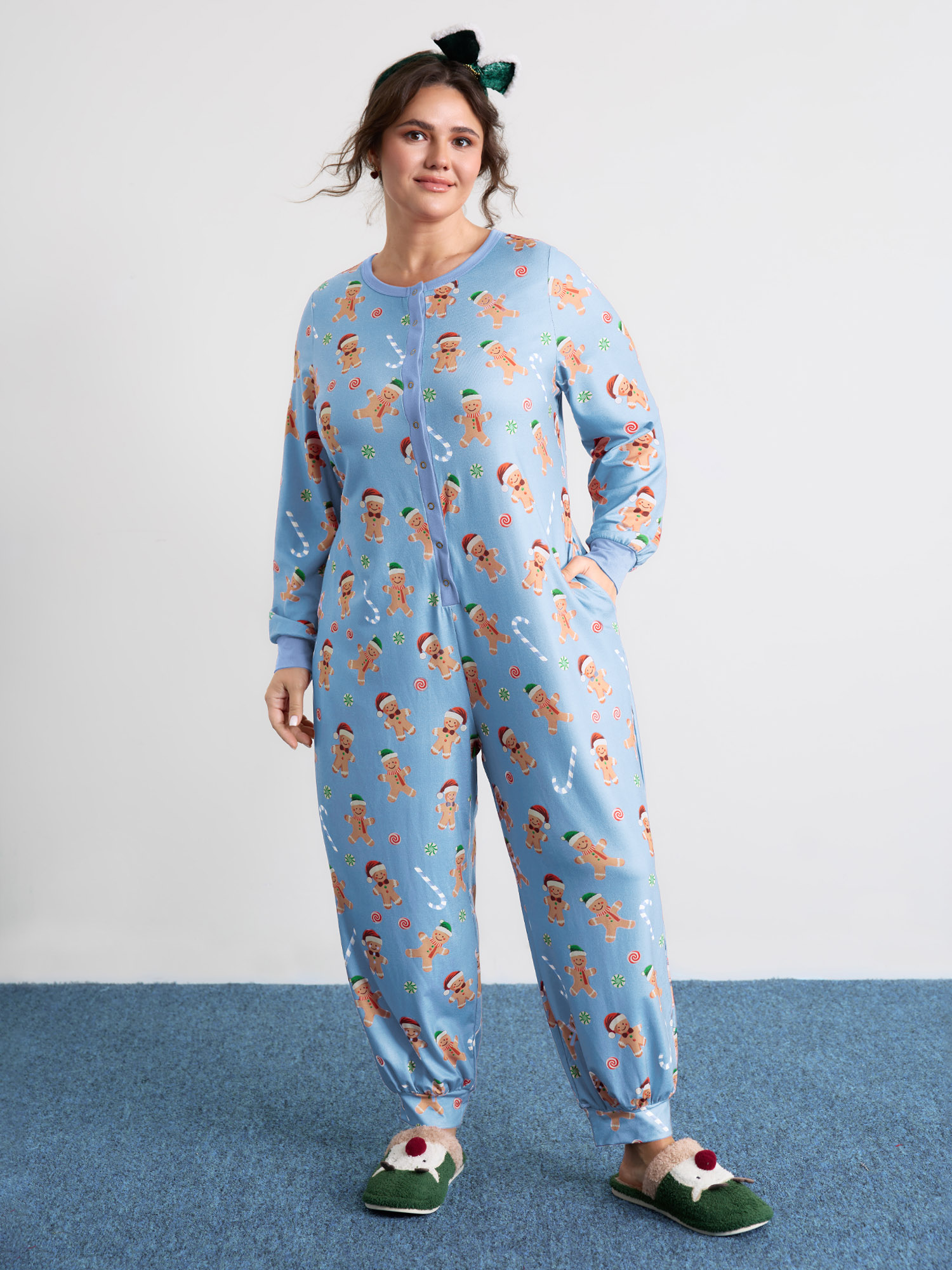 Side view of BloomChic Women's Plus Size Gingerbread Print Button Placket Jumpsuit LightBlue not graphics 30/6X
