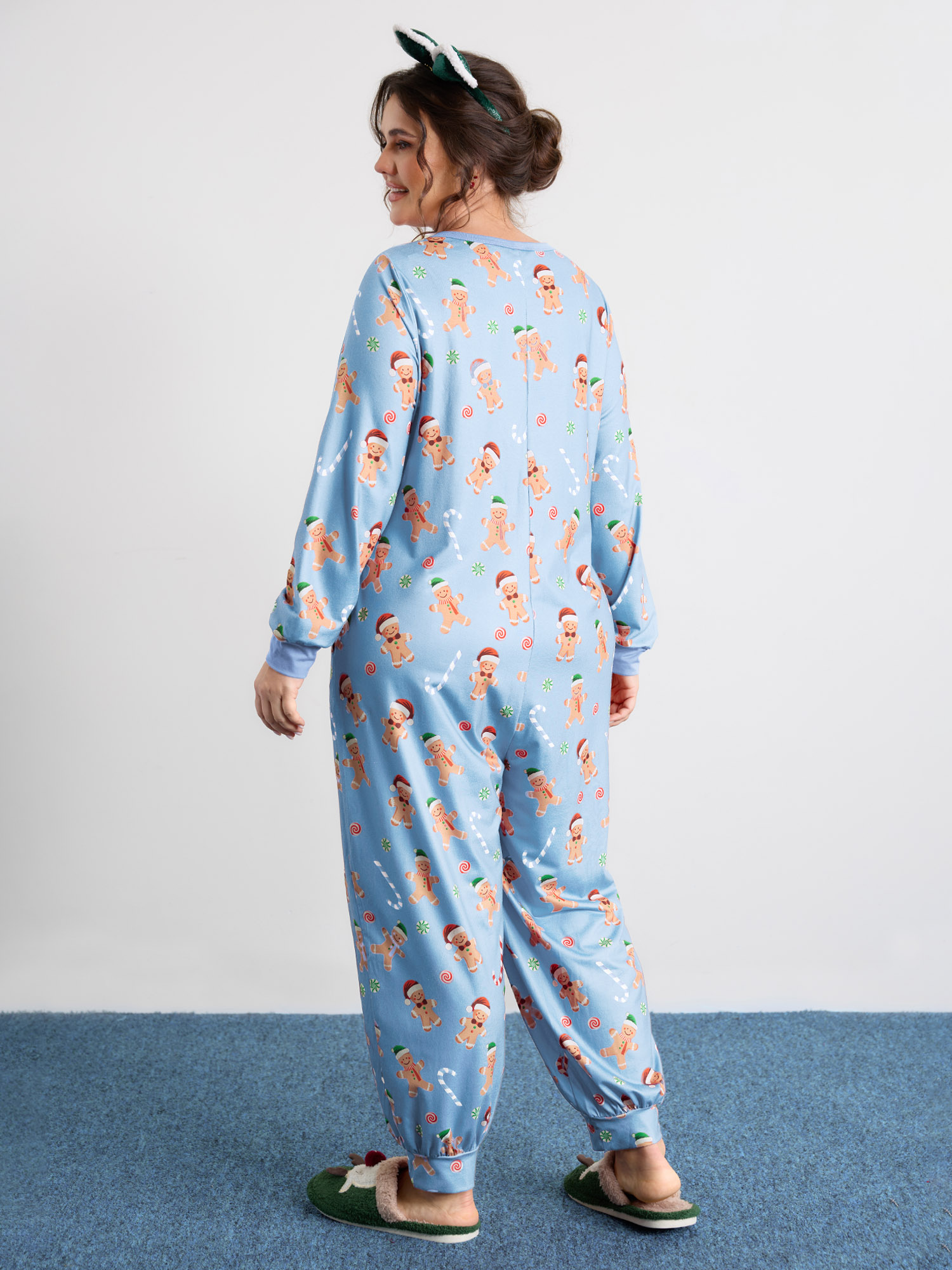 Side view of BloomChic Women's Plus Size Gingerbread Print Button Placket Jumpsuit LightBlue not graphics 30/6X