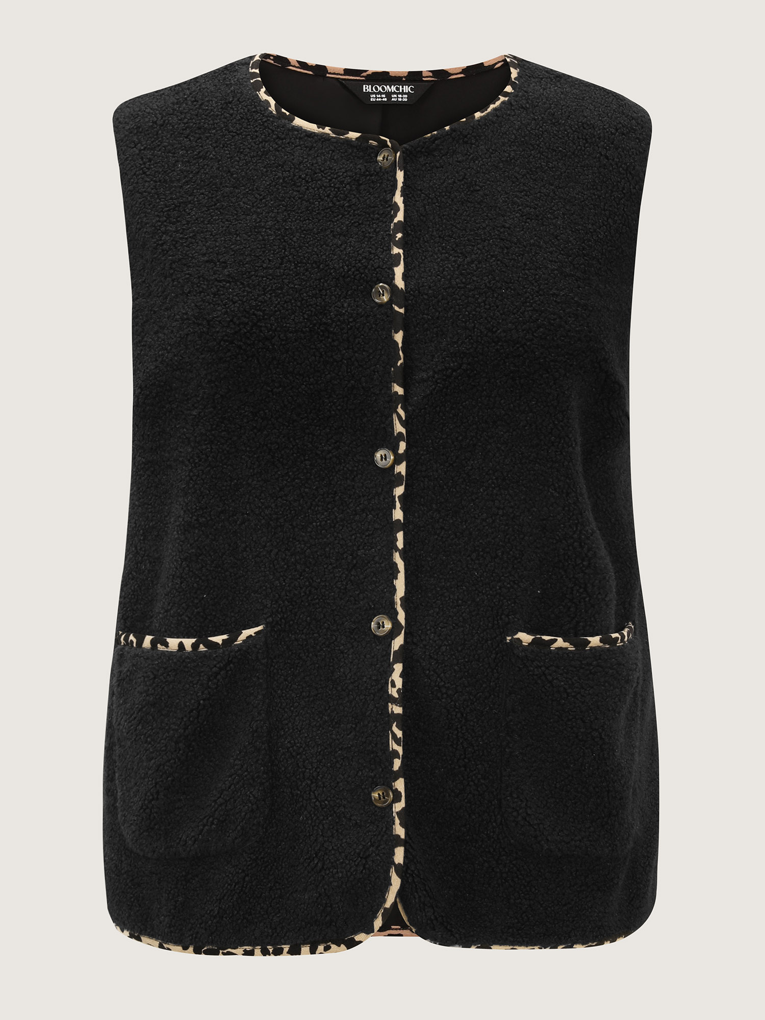 Side view of BloomChic Women's Plus Size Faux Shearling Patchwork Leopard Edge Vest Black Colorblock 14-16/1X