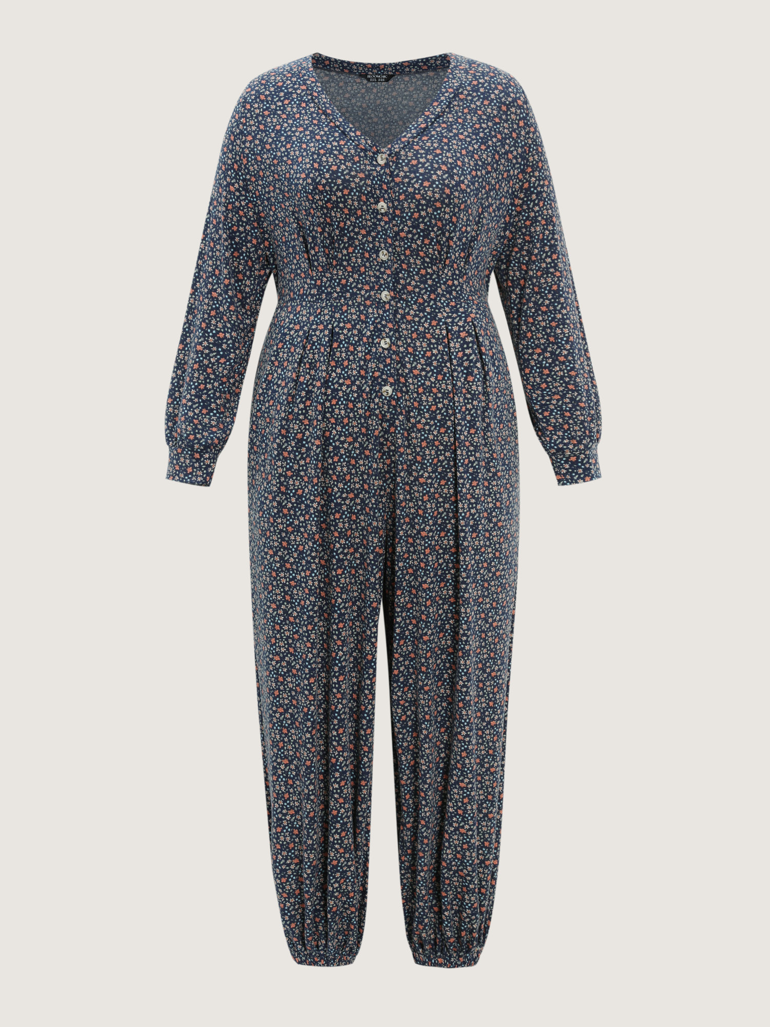 Side view of BloomChic Women's Plus Size Floral Print V-Neck Button Front Lounge Jumpsuit Indigo Natural Flowers Maxi 28/5X