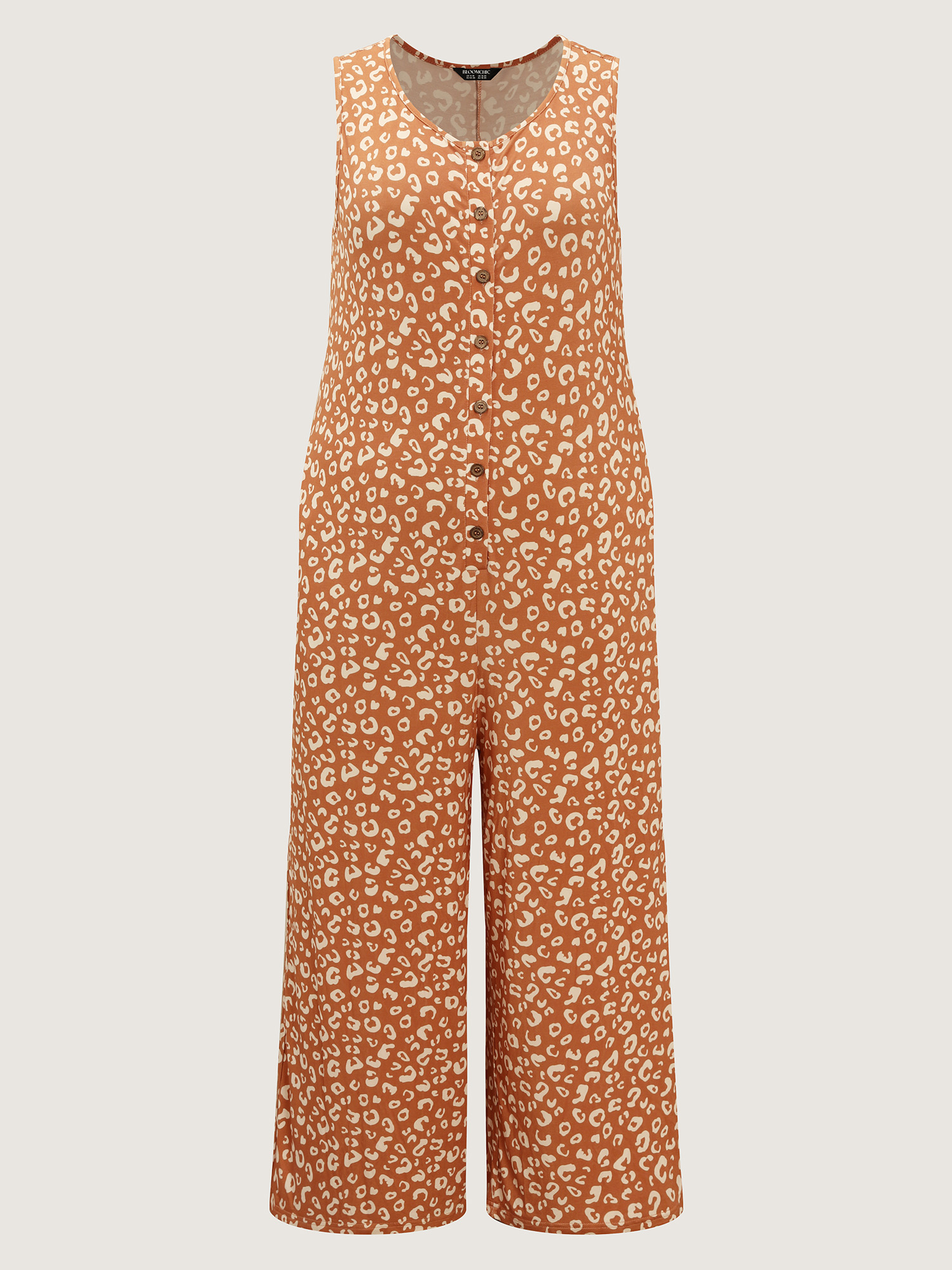 Side view of BloomChic Women's Plus Size Leopard Print Sleeveless Button Front Lounge jumpsuit Yellowishbrown Maxi 26/4X