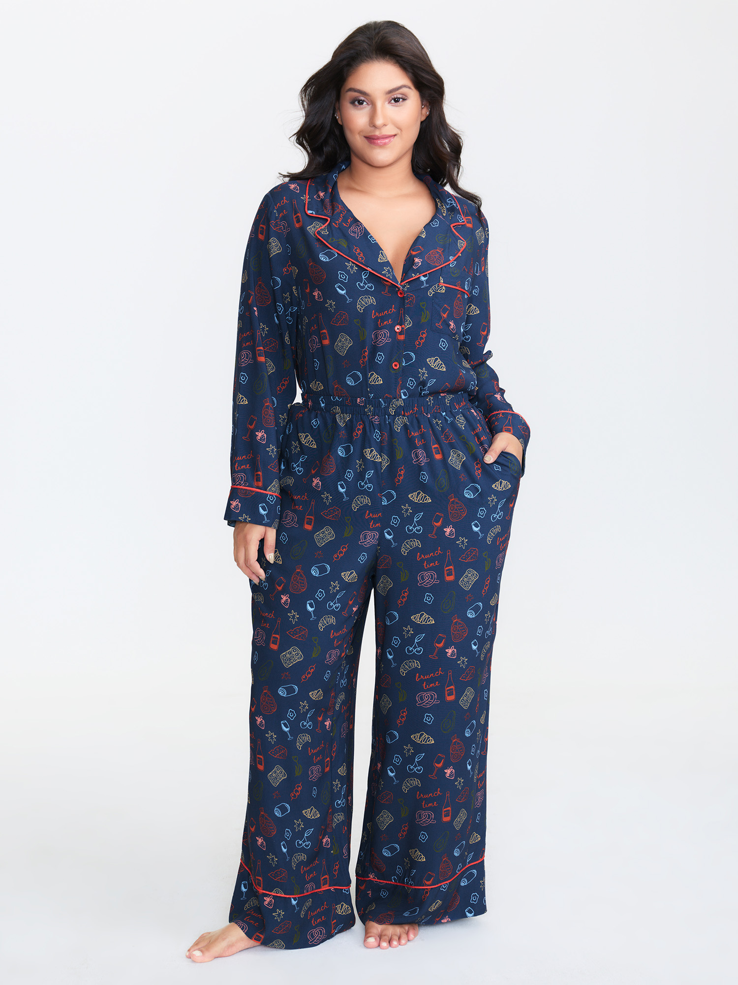 Side view of BloomChic Women's Plus Size Breakfast Print Elastic Waist Pocket Pajama Bottoms Indigo Fruit and vegetable print Knee Woven ribbon&lace trim 26/4X