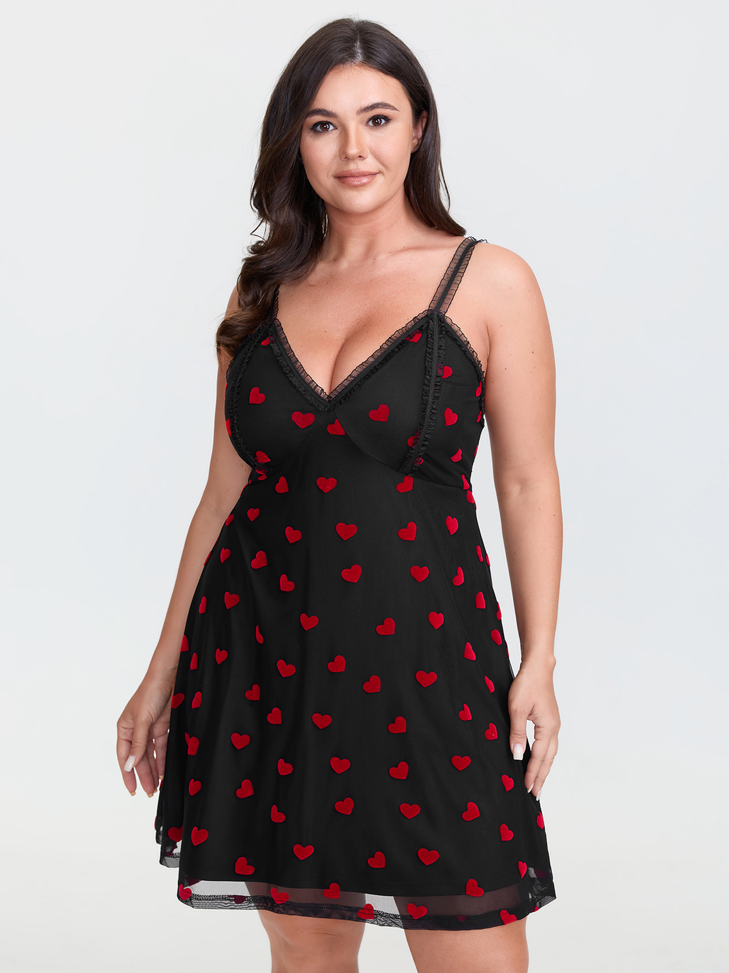 Side view of BloomChic Women's Plus Size Romantic Heart Print Sheer Nightgown Black Sleeveless Short 22-24/3X