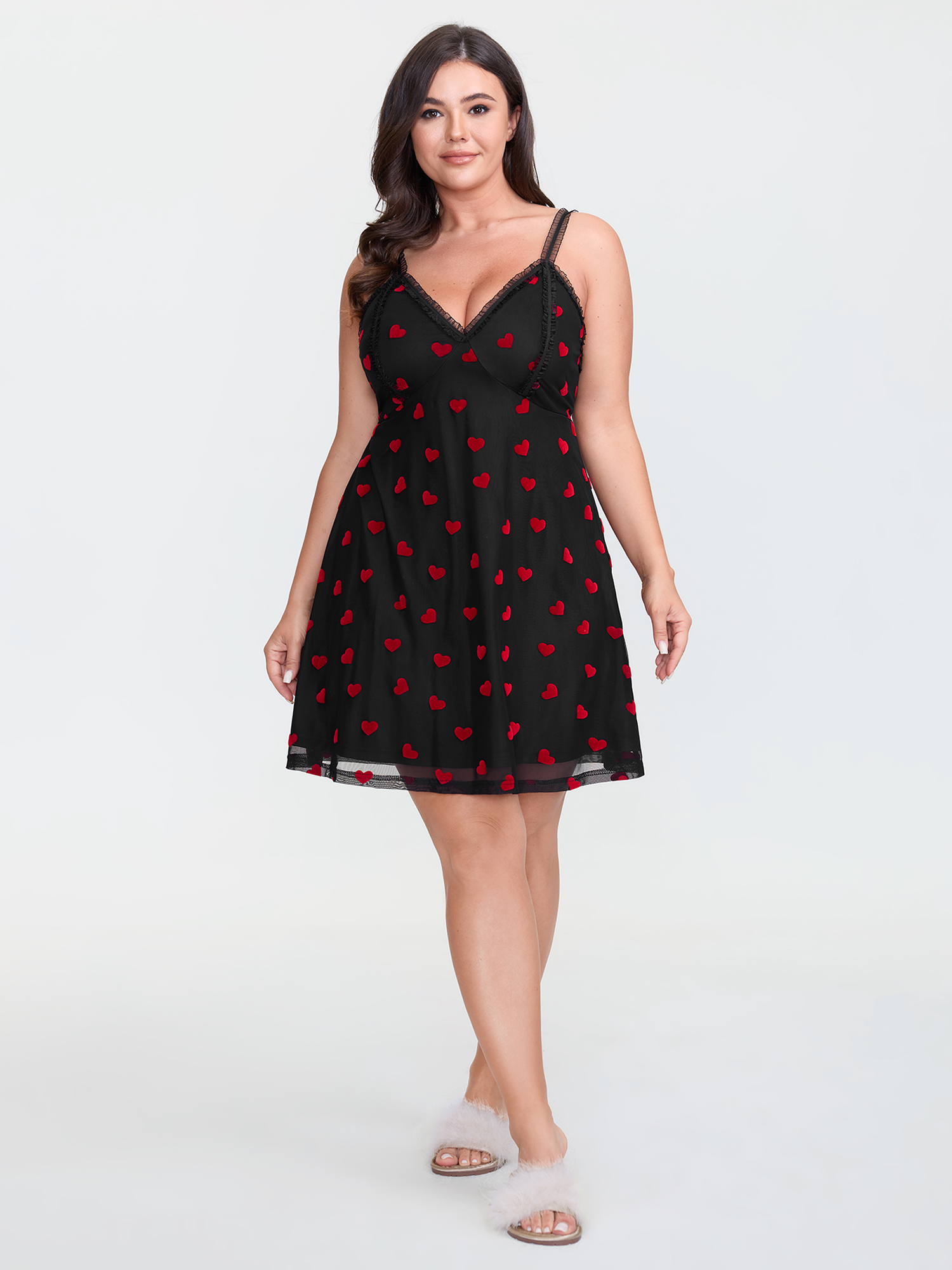 Side view of BloomChic Women's Plus Size Romantic Heart Print Sheer Nightgown Black Sleeveless Short 22-24/3X