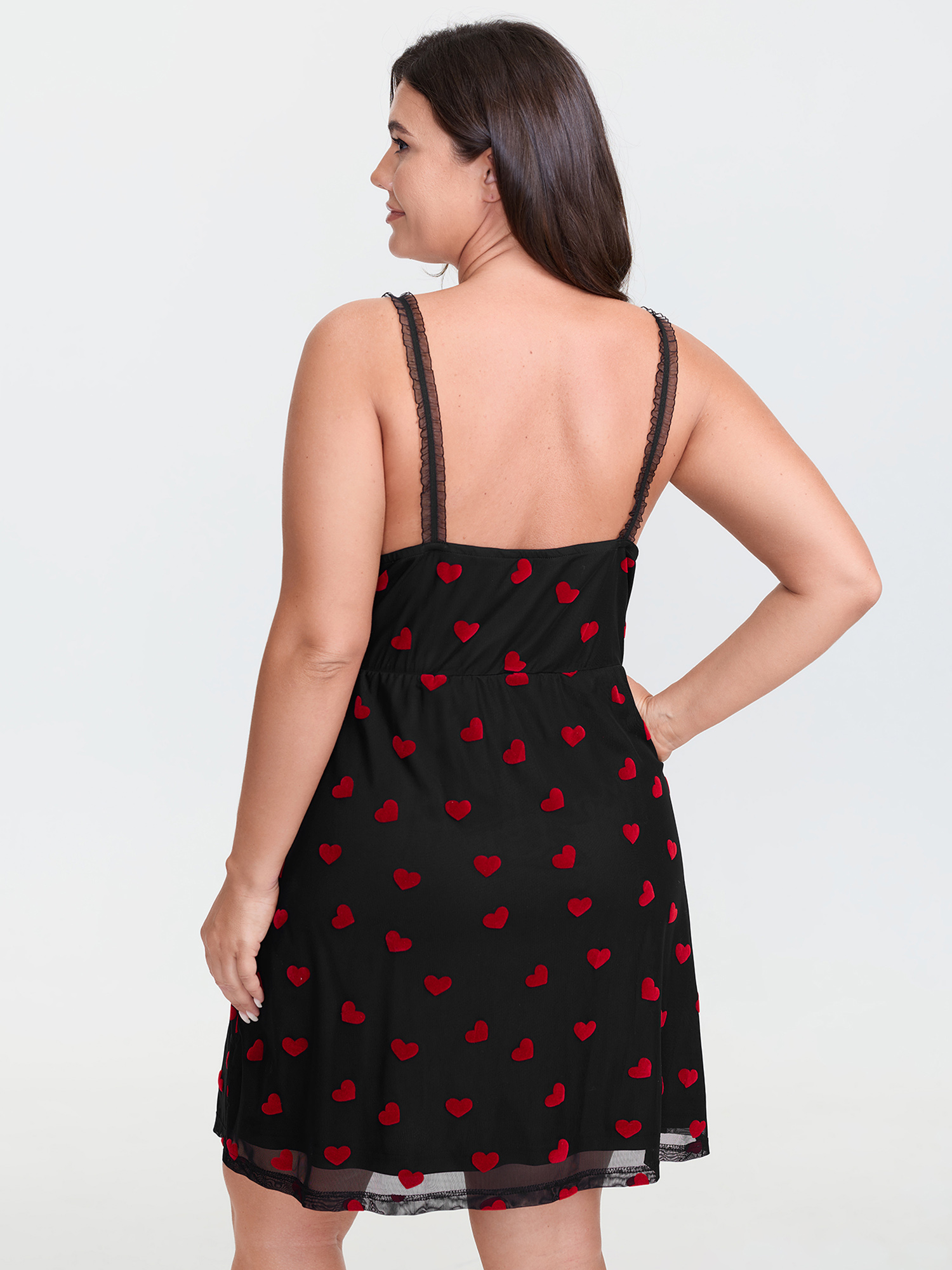 Side view of BloomChic Women's Plus Size Romantic Heart Print Sheer Nightgown Black Sleeveless Short 22-24/3X