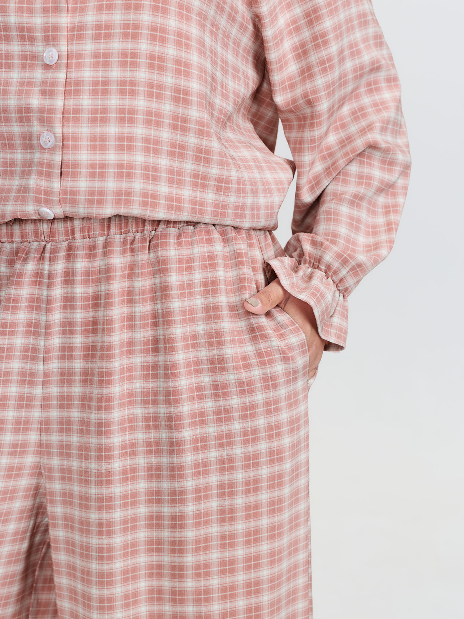 Side view of BloomChic Women's Plus Size Gingham Print Ruffled Hem Co-Ord Pajama Set Rouge not graphics 28/5X
