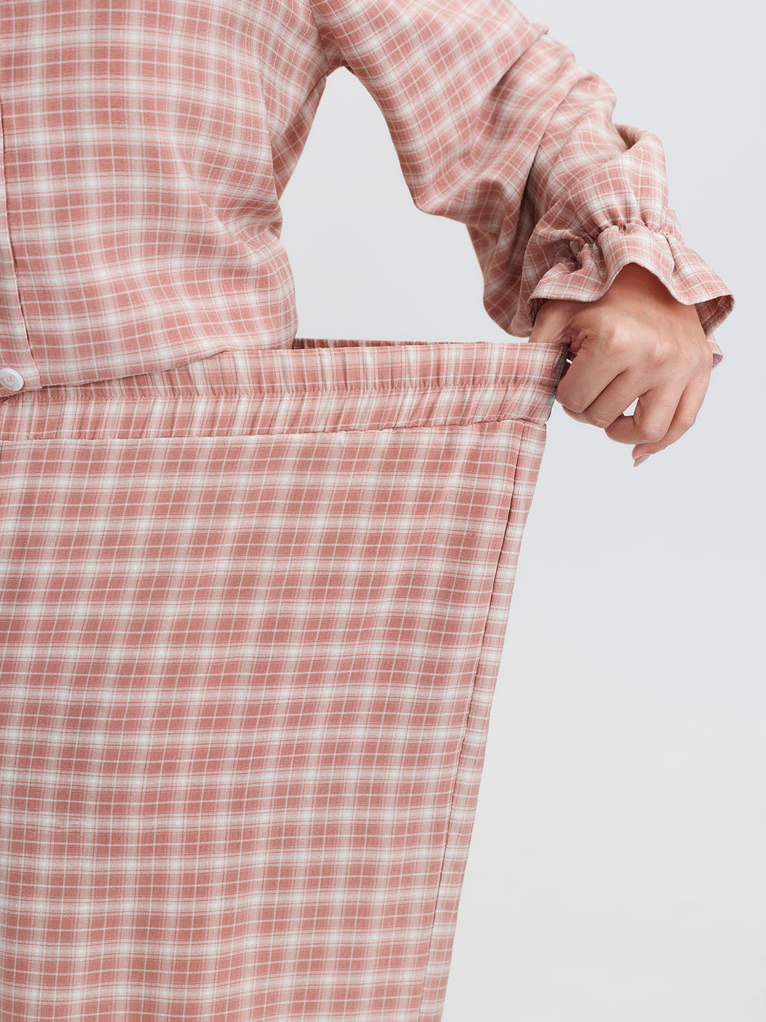Side view of BloomChic Women's Plus Size Gingham Print Ruffled Hem Co-Ord Pajama Set Rouge not graphics 28/5X