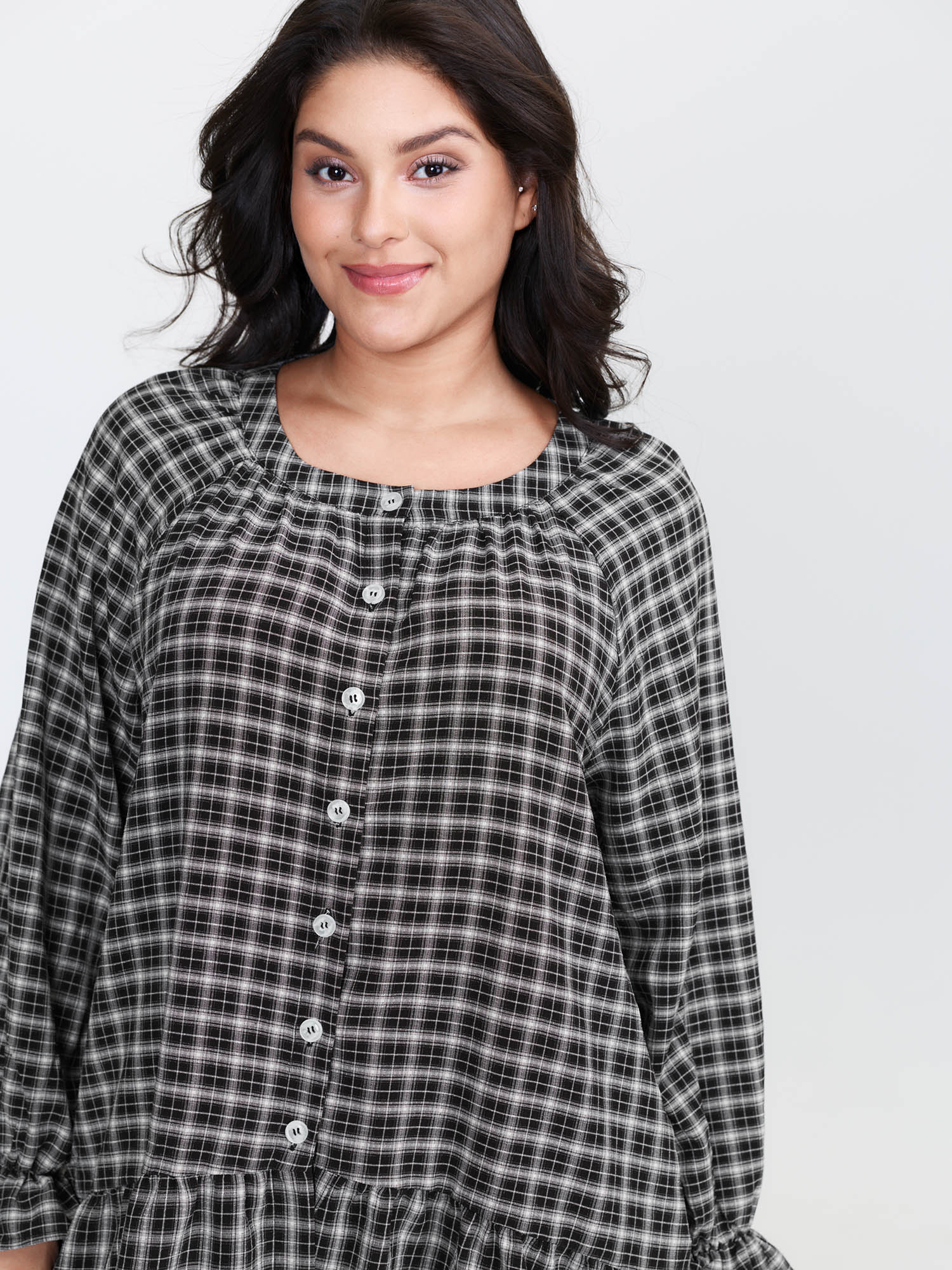 Side view of BloomChic Women's Plus Size Gingham Print Ruffled Hem Co-Ord Pajama Set BlackFlower not graphics 12/L