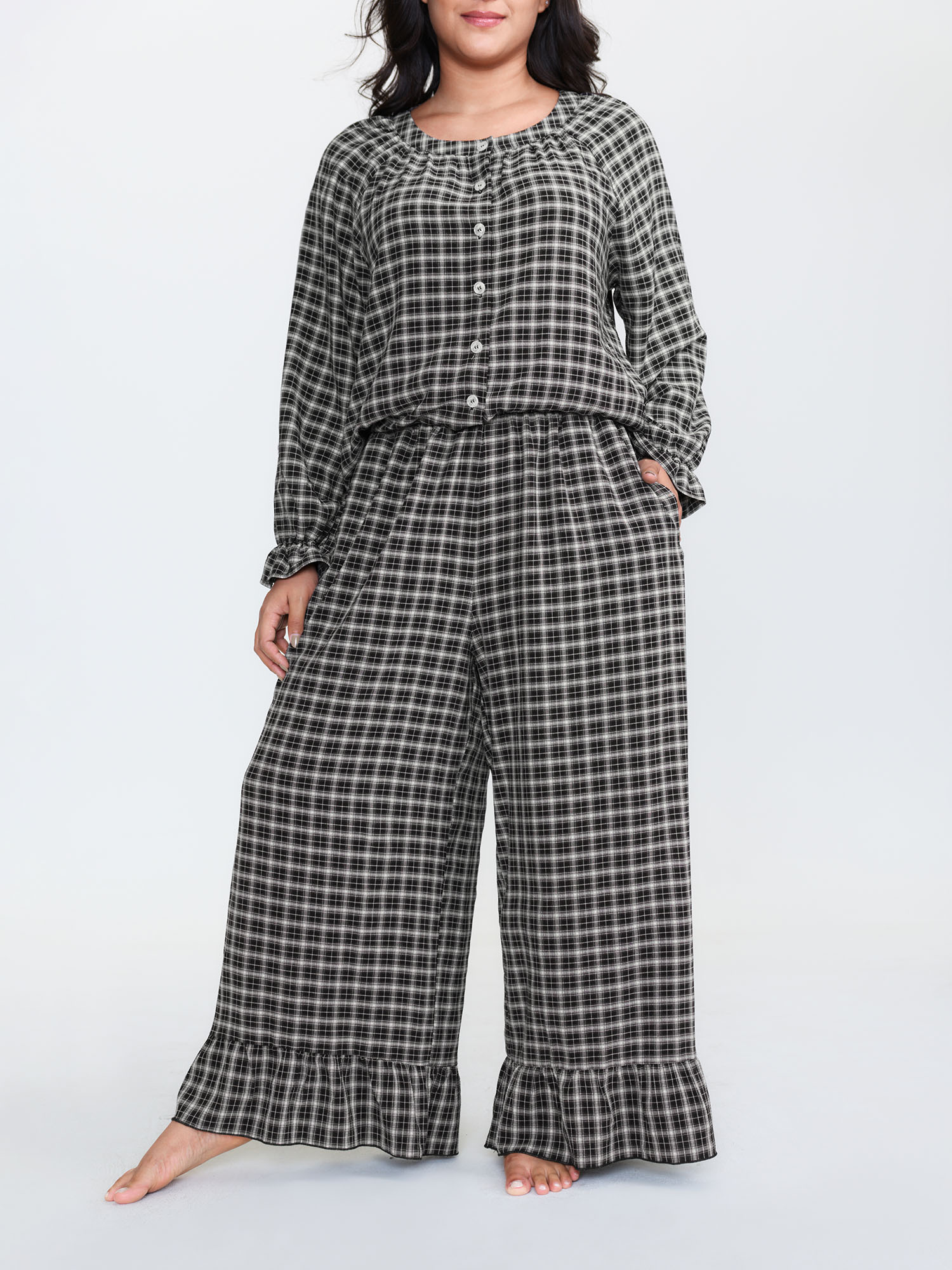 Side view of BloomChic Women's Plus Size Gingham Print Ruffled Hem Co-Ord Pajama Set BlackFlower not graphics 12/L