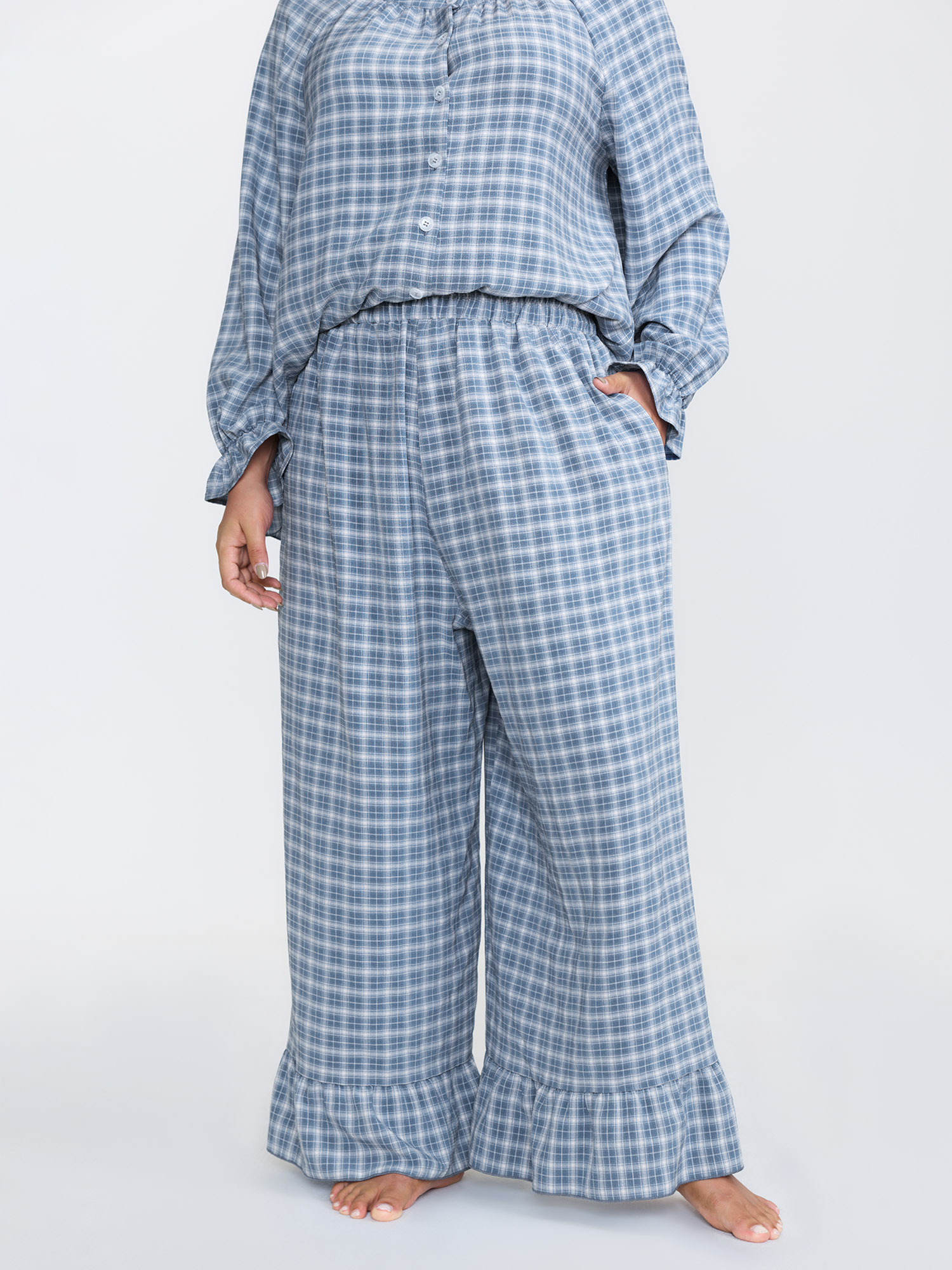 Side view of BloomChic Women's Plus Size Gingham Print Ruffled Hem Co-Ord Pajama Set Mediumblue not graphics 26/4X