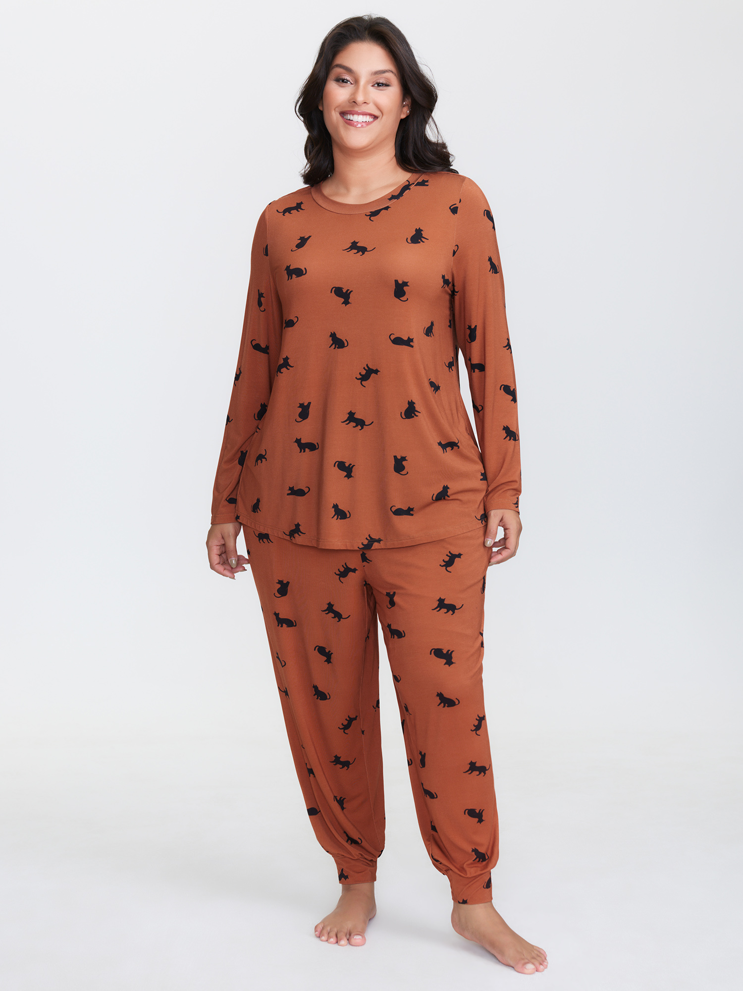 Side view of BloomChic Women's Plus Size Midnight Cat Print Stretchy Lounge Bottoms Yellowishbrown 10/M