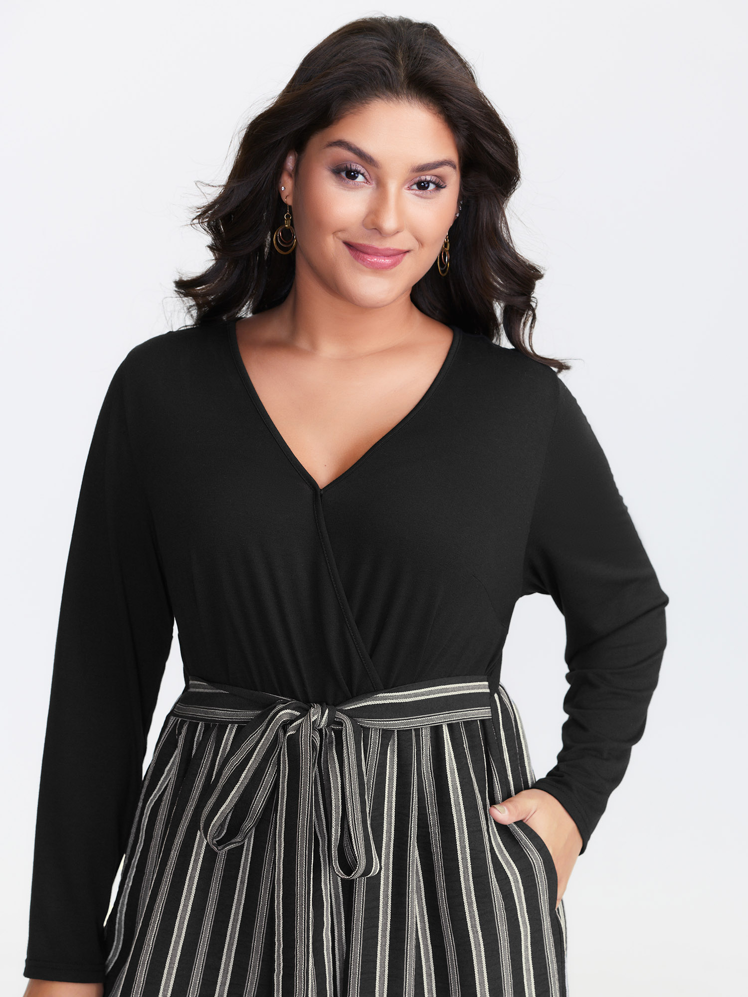 Side view of BloomChic Women's Plus Size Stripes Color Contrast Jumpsuit Black Casual 30/6X
