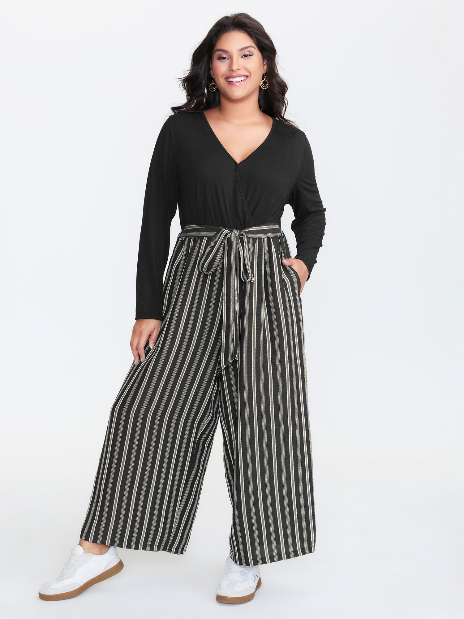 Side view of BloomChic Women's Plus Size Stripes Color Contrast Jumpsuit Black Casual 30/6X