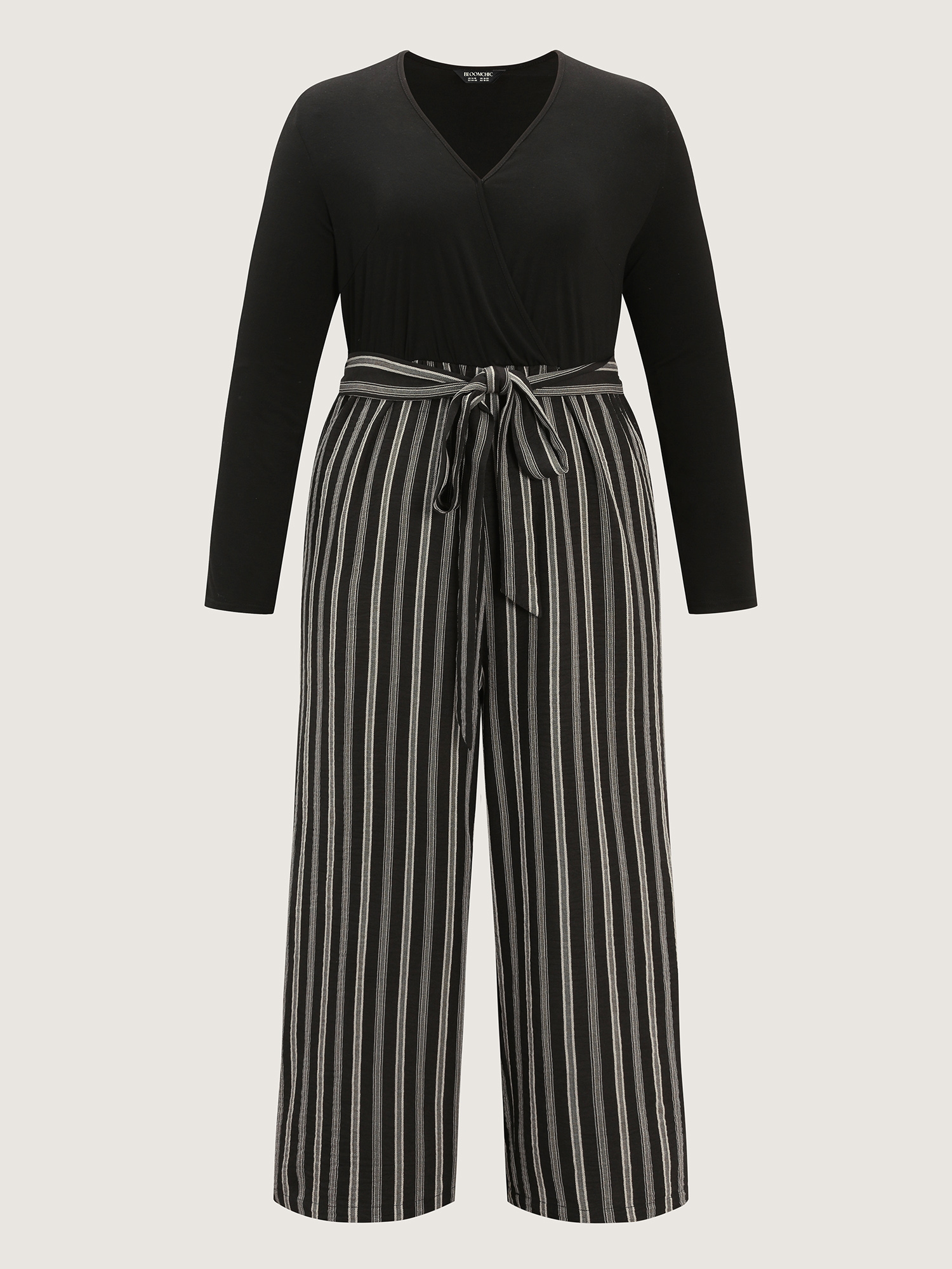 Side view of BloomChic Women's Plus Size Stripes Color Contrast Jumpsuit Black Casual 30/6X