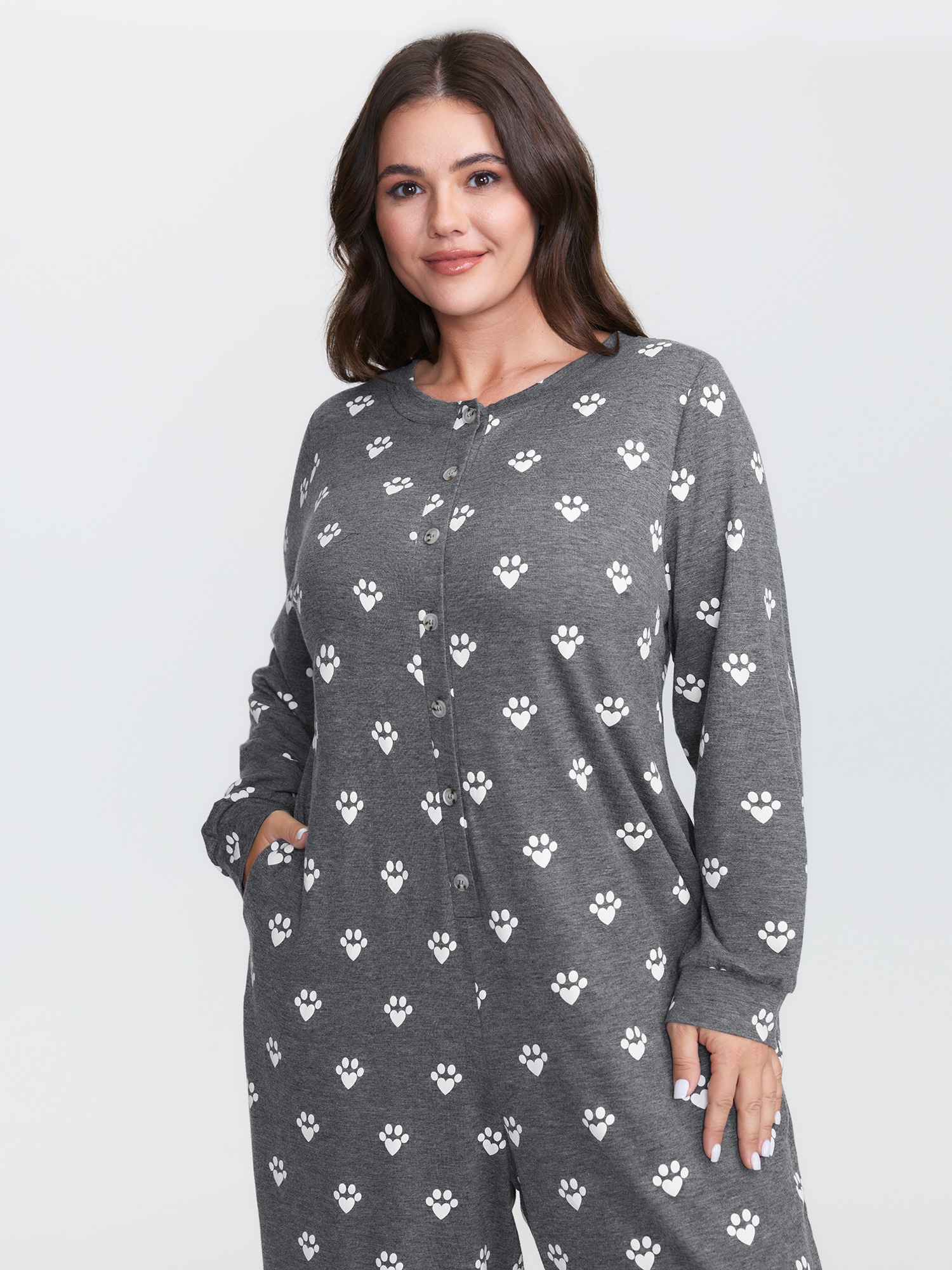 Side view of BloomChic Women's Plus Size Paw Print Button Lounge Onesie DarkGray not graphics 14-16/1X