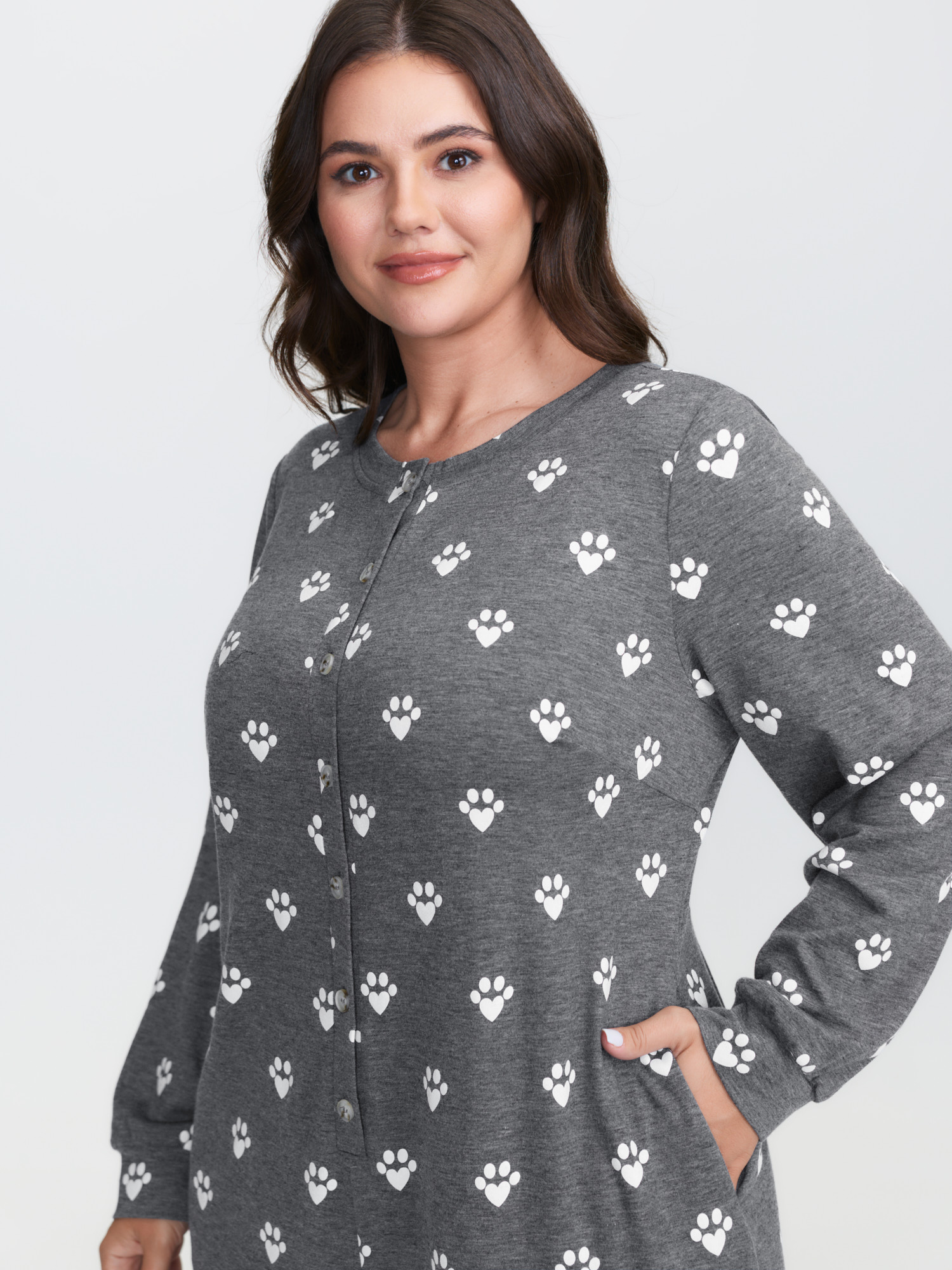 Side view of BloomChic Women's Plus Size Paw Print Button Lounge Onesie DarkGray not graphics 14-16/1X